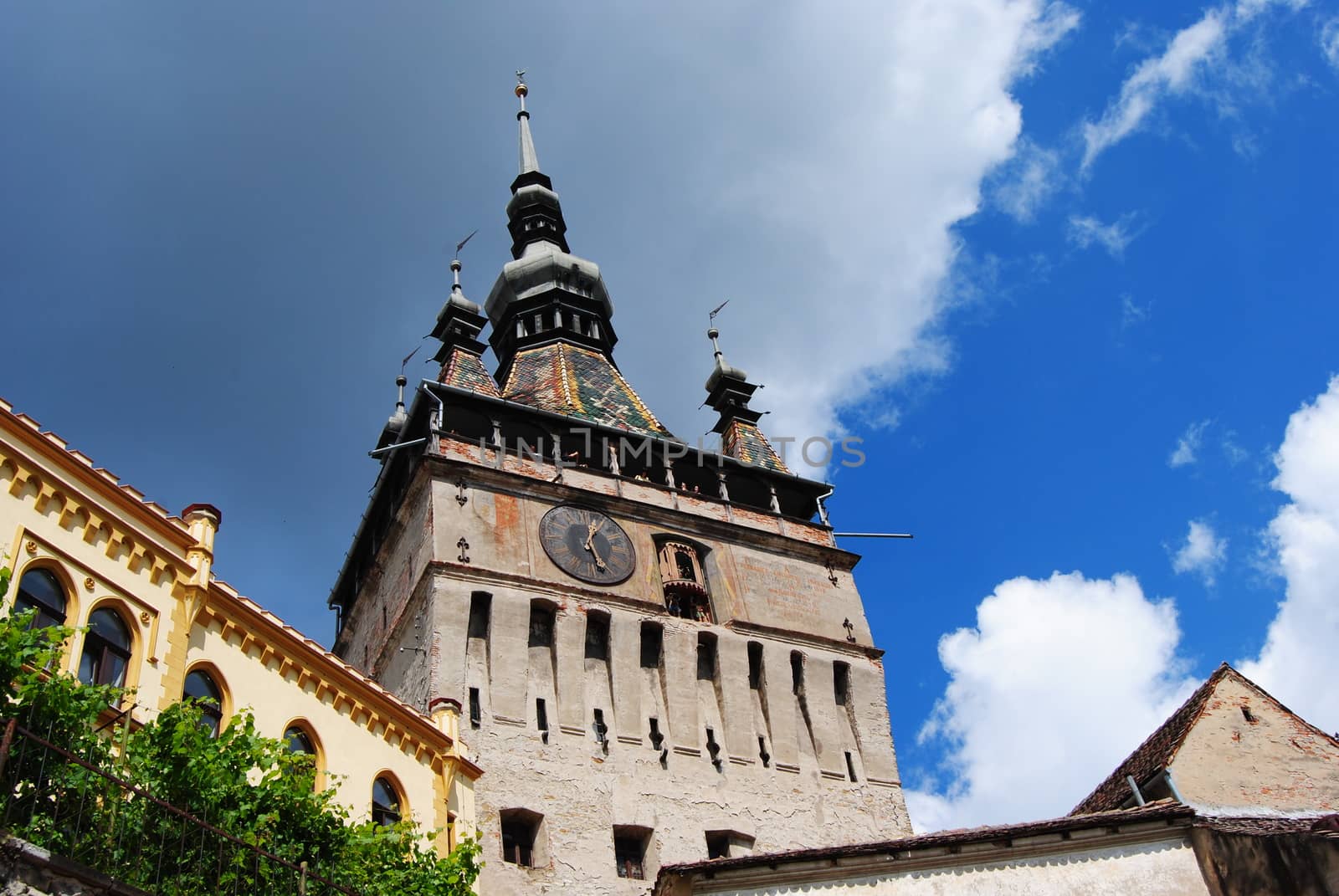 The Clock Tower in Sighisoara, Romania was built in the XIV century and has 64 meters high. It is a historical and architectural monument of Sighisoara and the biggest of the town's nine towers