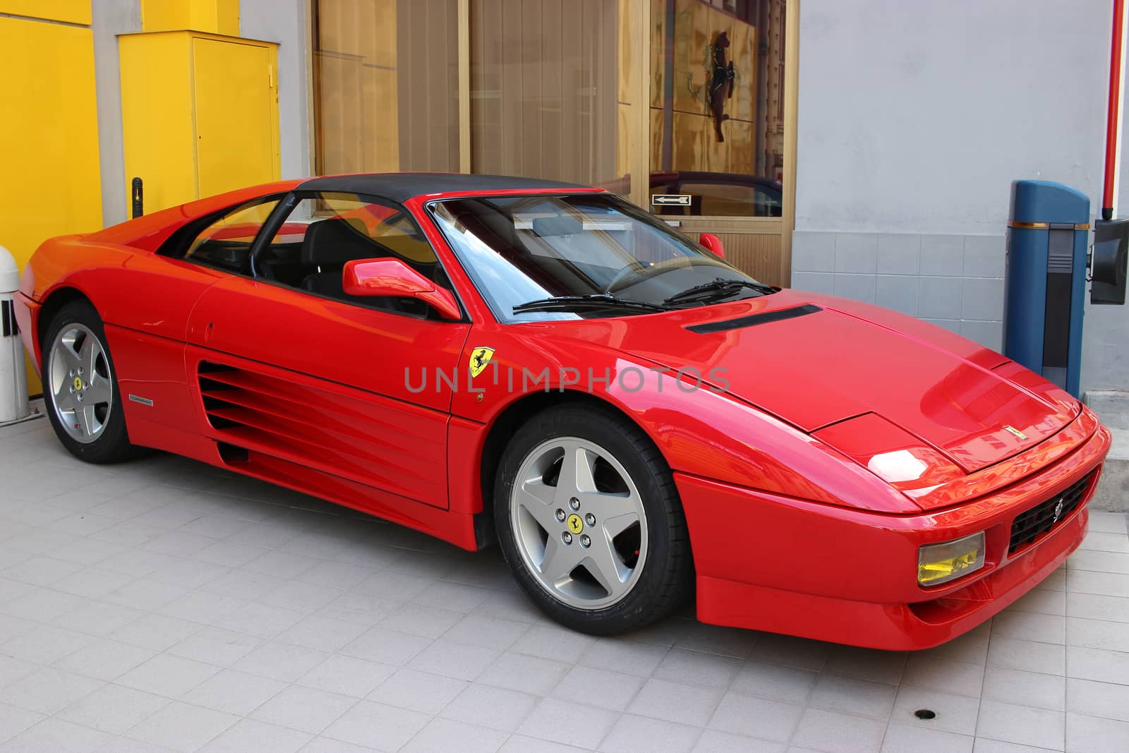 La Condamine, Monaco - March 17, 2016: Red Ferrari 348 TS For Sale Parked in Front of a Ferrari Car Dealer in Monaco