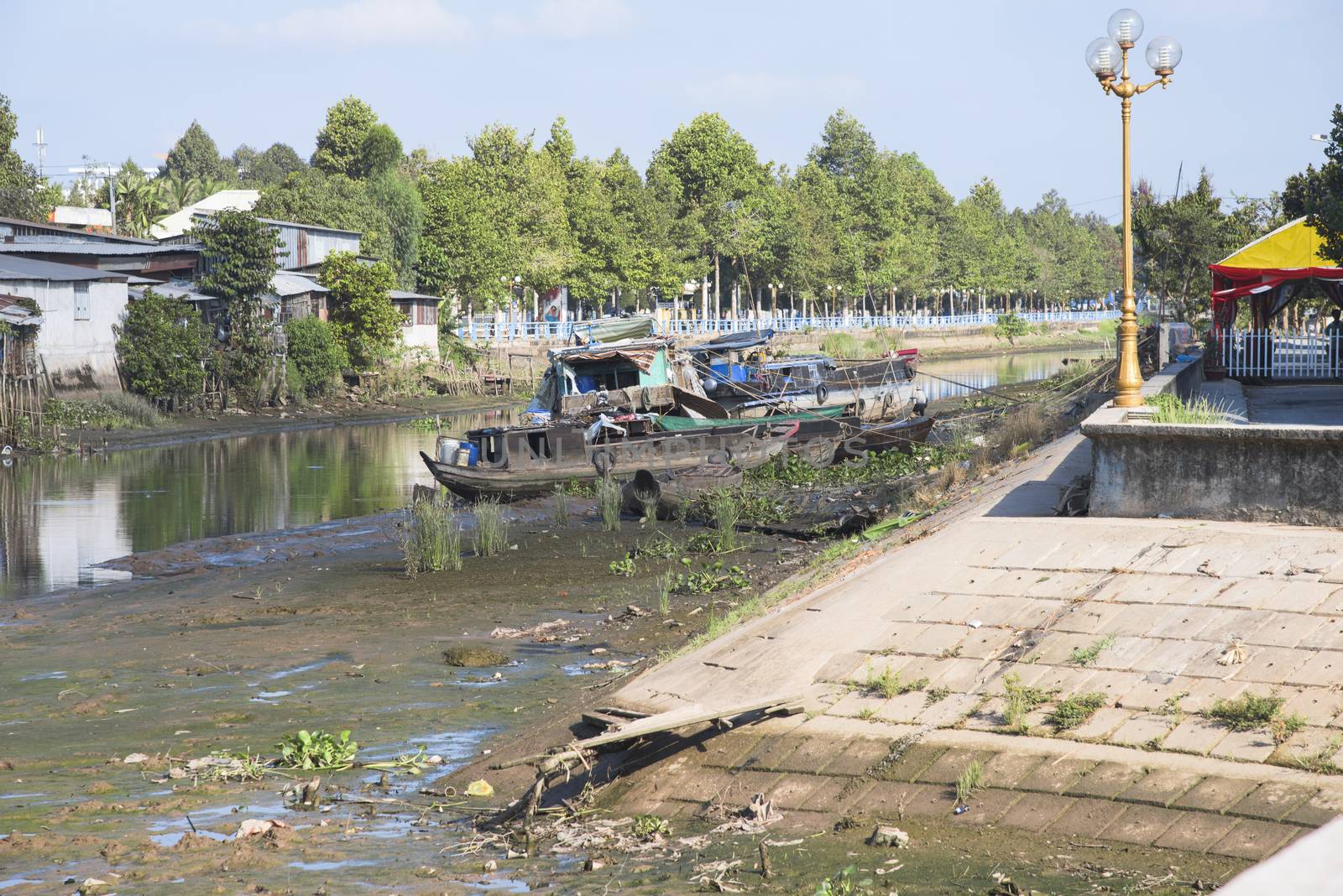 Cao Lanh, Vietnam - March 19, 2016: Due to El Nino and an increasing number of dams upstream, The Mekong Delta is seeing its worst drought in decades, with empty waterways and dry rice fields.