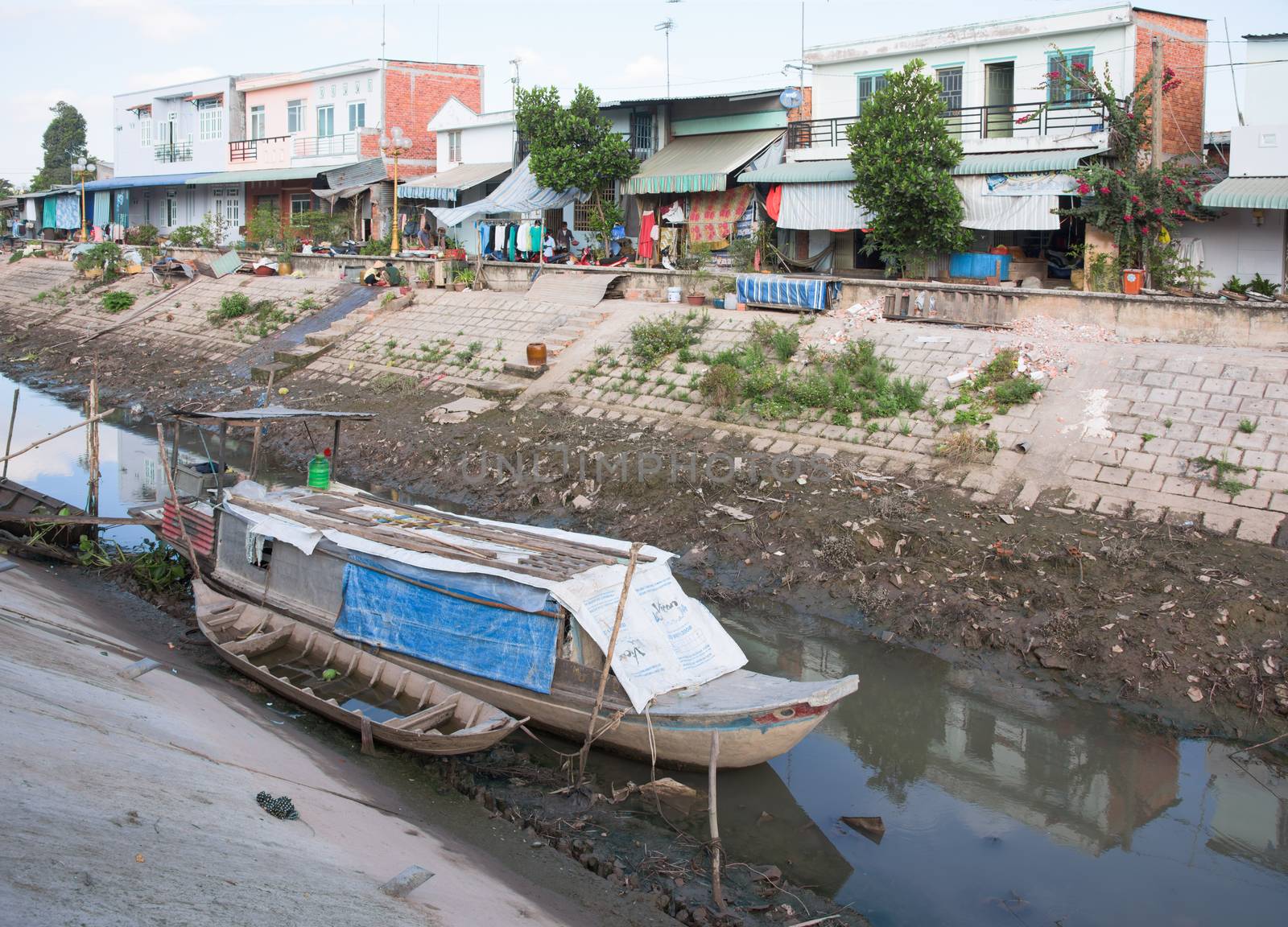 Cao Lanh, Vietnam - March 19, 2016: Due to El Nino and an increasing number of dams upstream, The Mekong Delta is seeing its worst drought in decades, with empty waterways and dry rice fields.