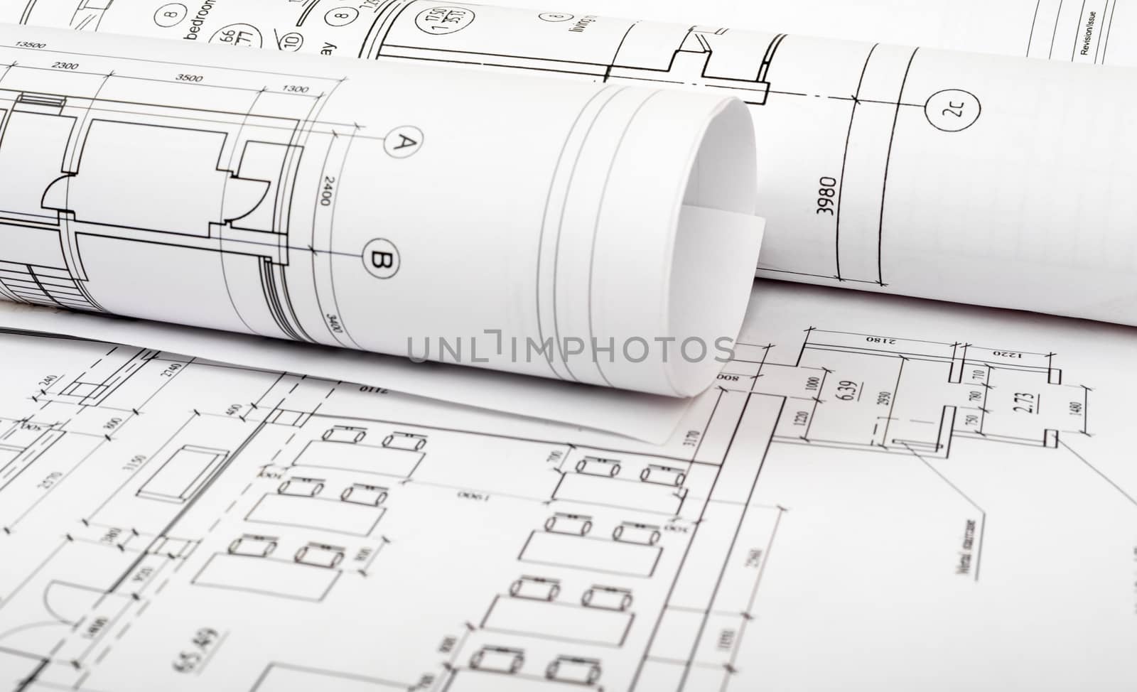 Rolls of blueprints, close up view. Building concept
