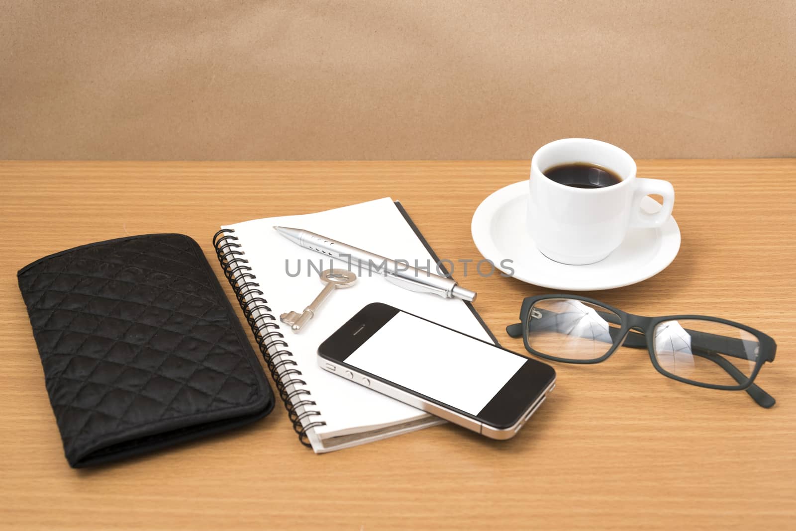 coffee and phone with notepad,key,eyeglasses and wallet by ammza12