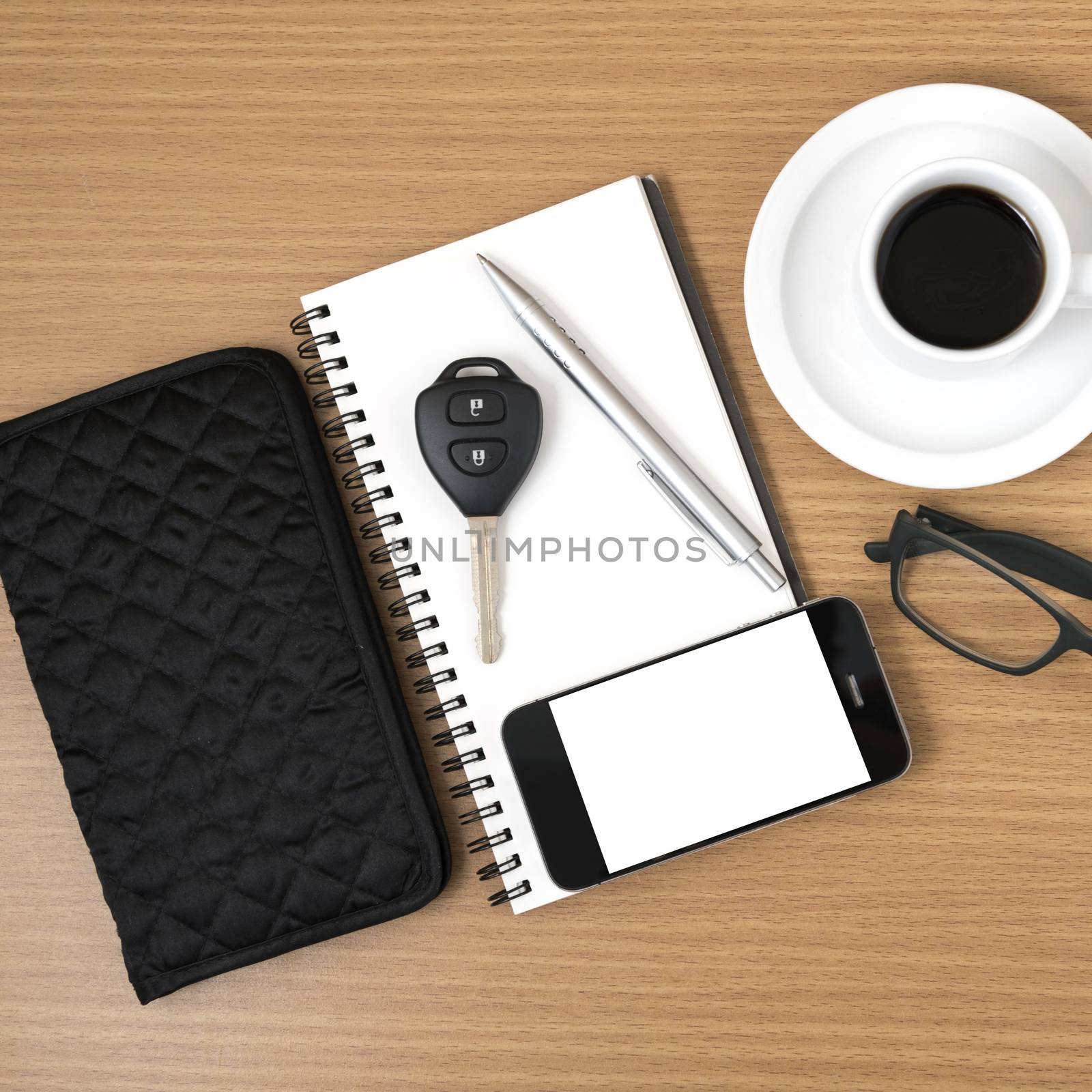 coffee and phone with notepad,car key,eyeglasses and wallet by ammza12