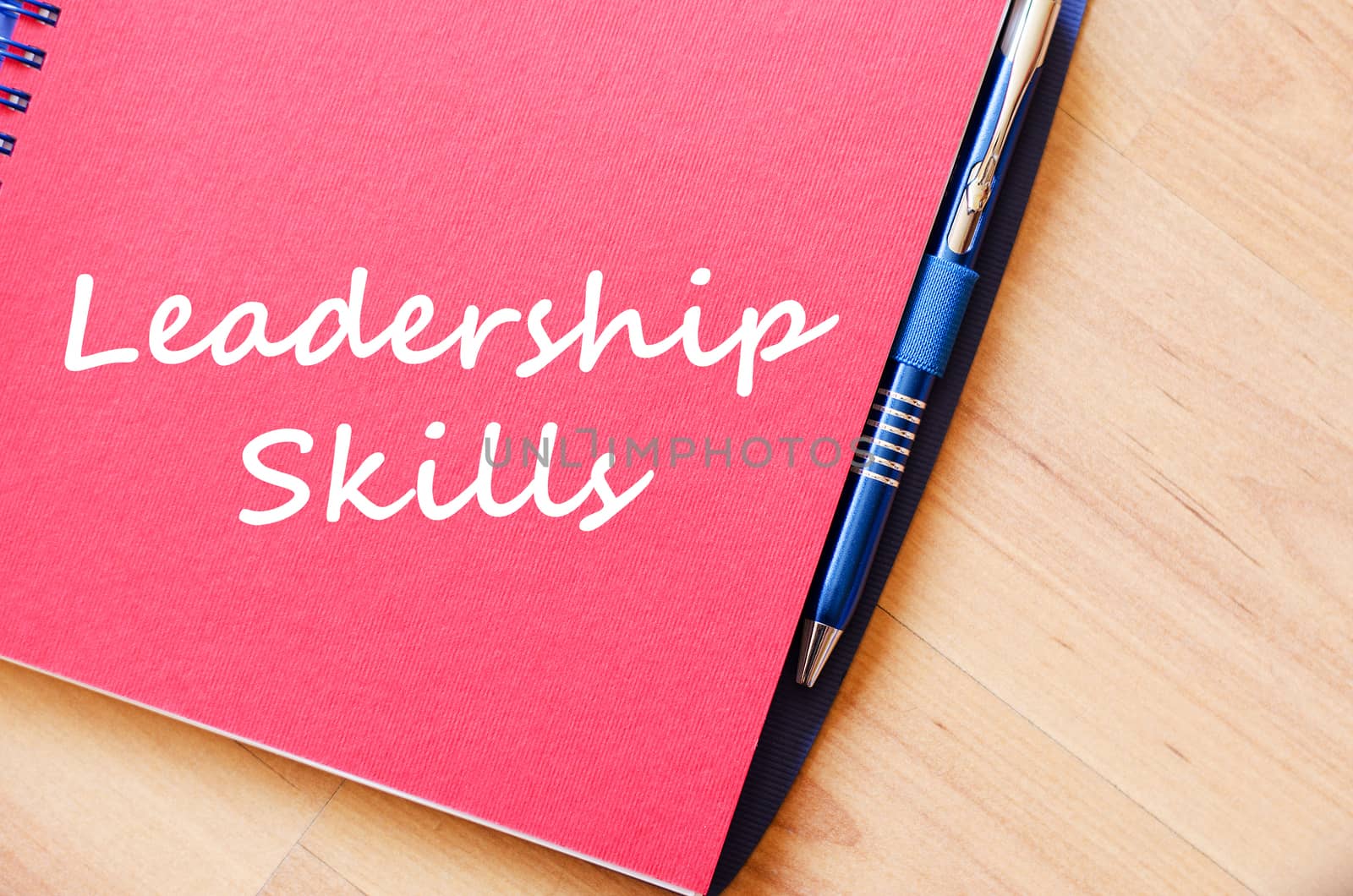 Leadership skills write on notebook by eenevski
