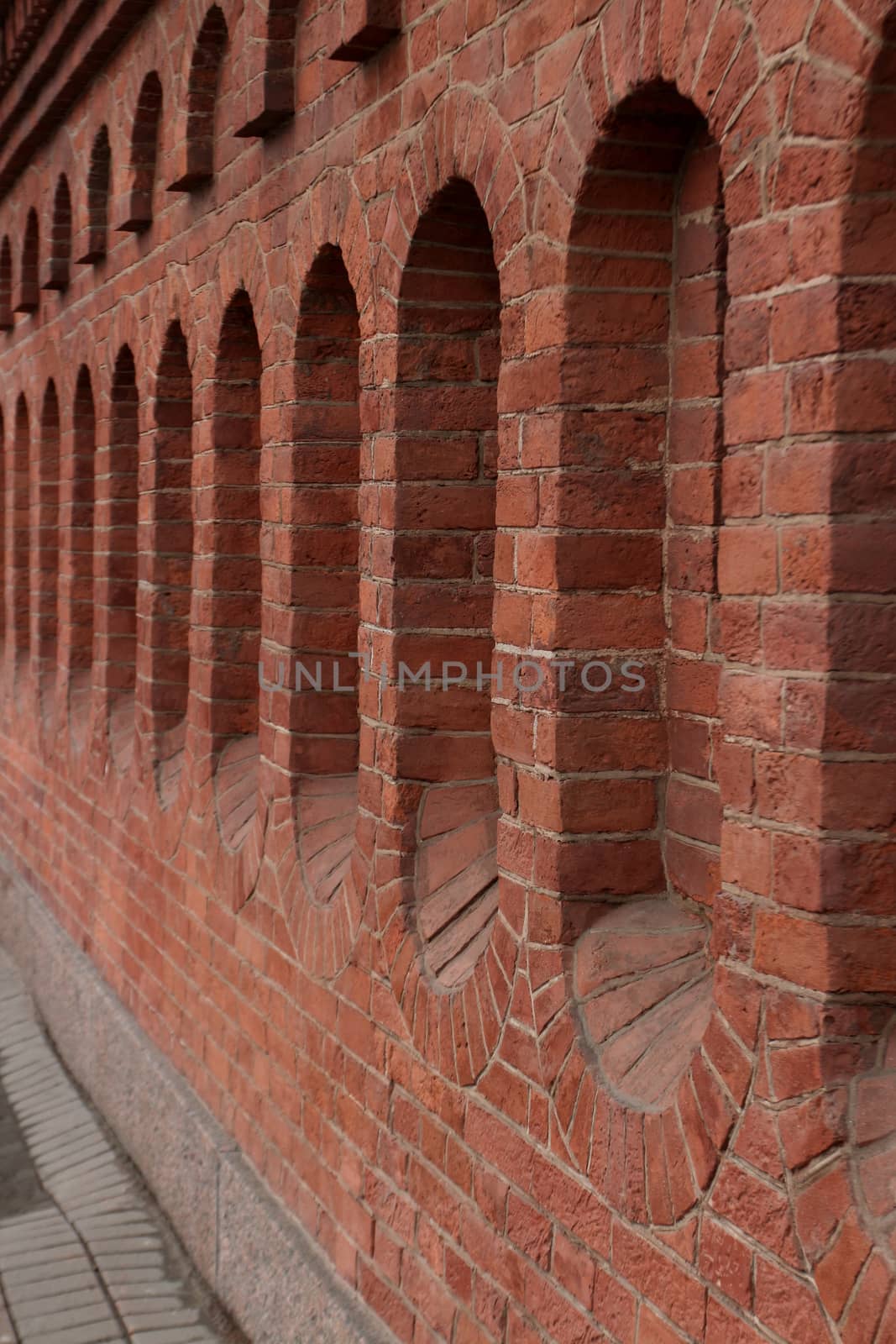 red brick fortress wall background close to