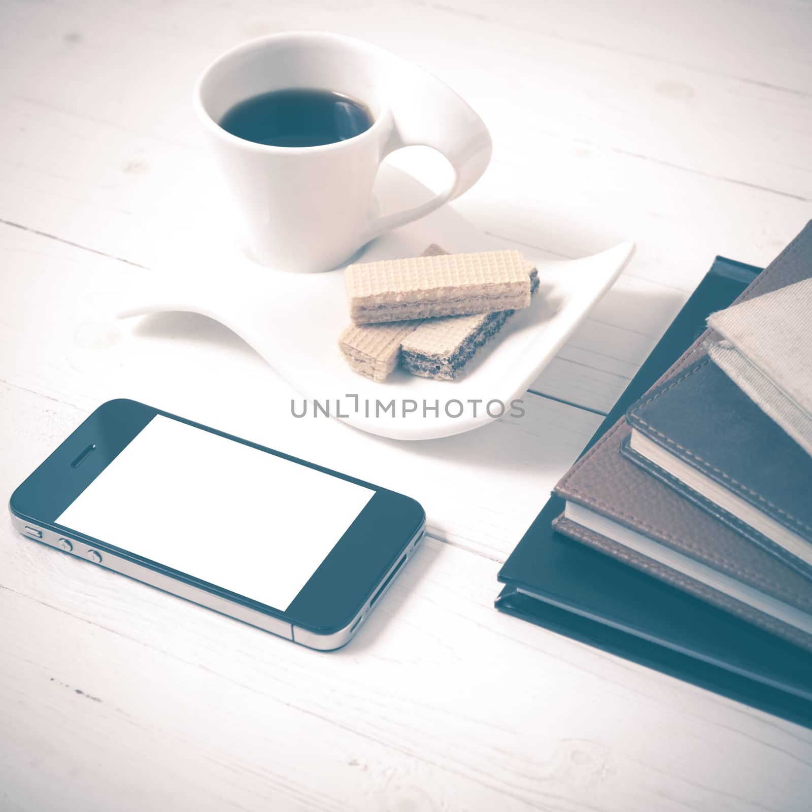 coffee cup with wafer,phone,stack of book vintage style by ammza12