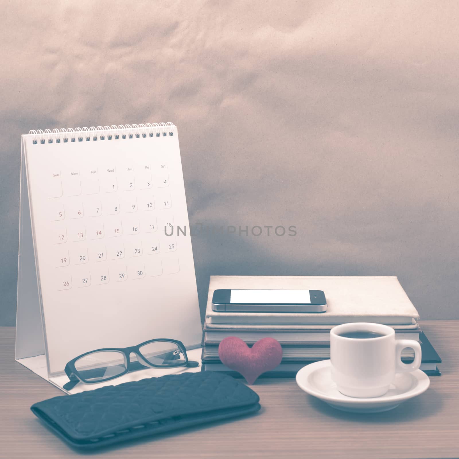 desktop : coffee with phone,stack of book,wallet,heart,eyeglasse by ammza12