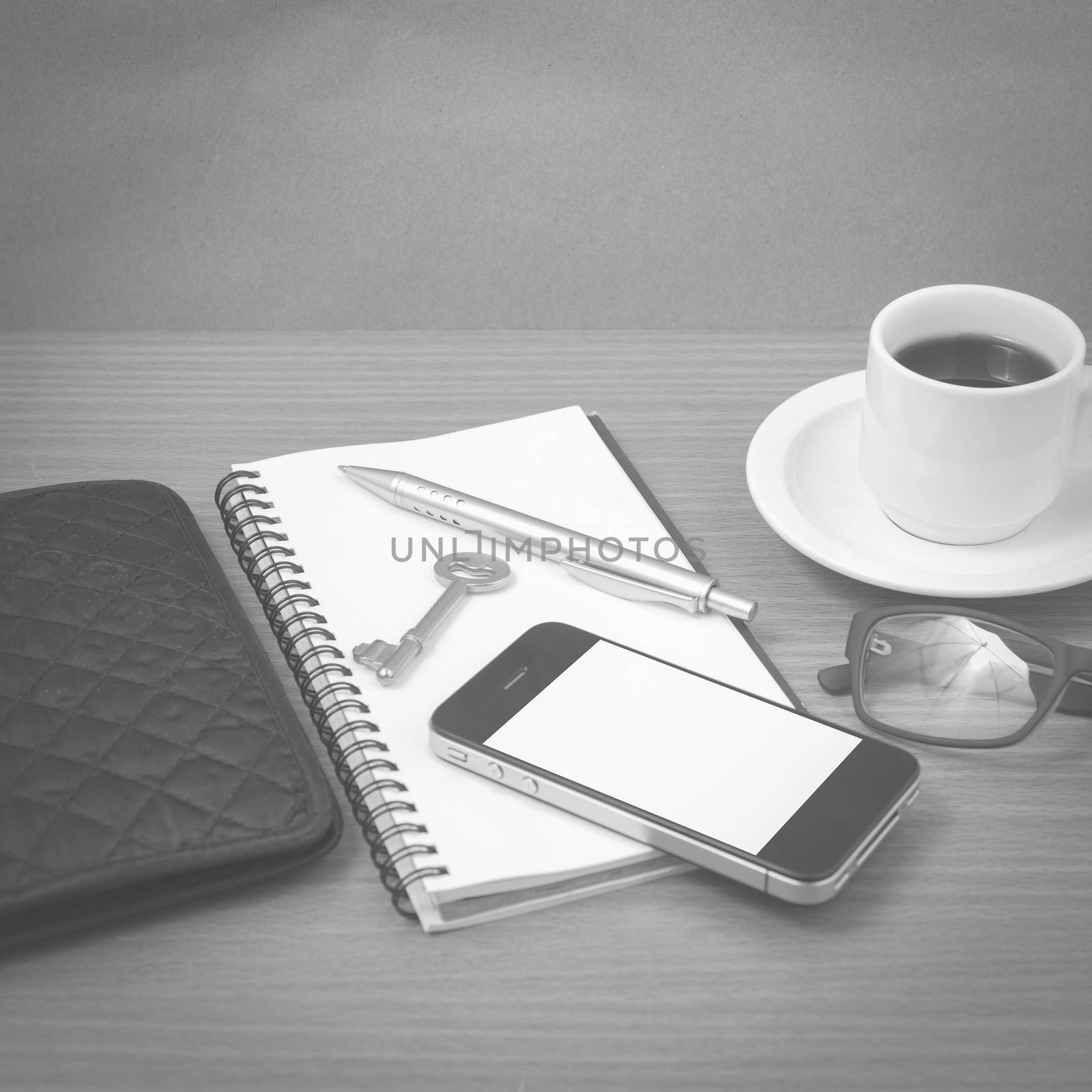 coffee and phone with notepad,key,eyeglasses and wallet black an by ammza12