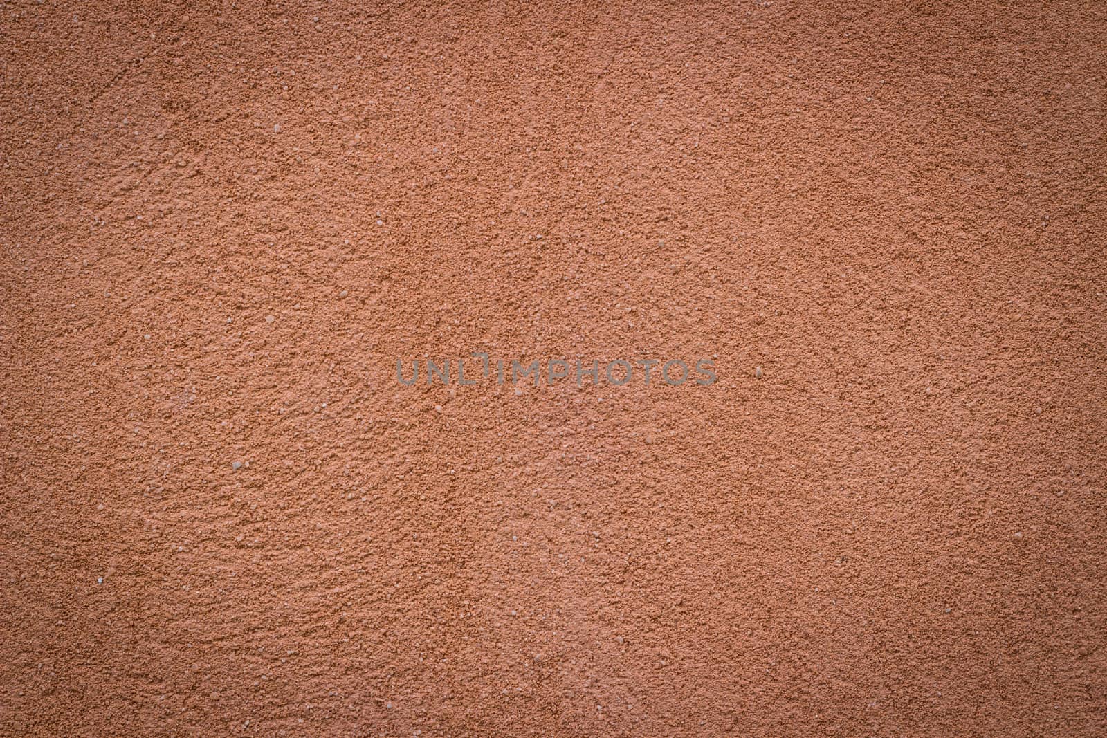 Orange wall background and texture with vignetting and blank copyspace for text or advertising.