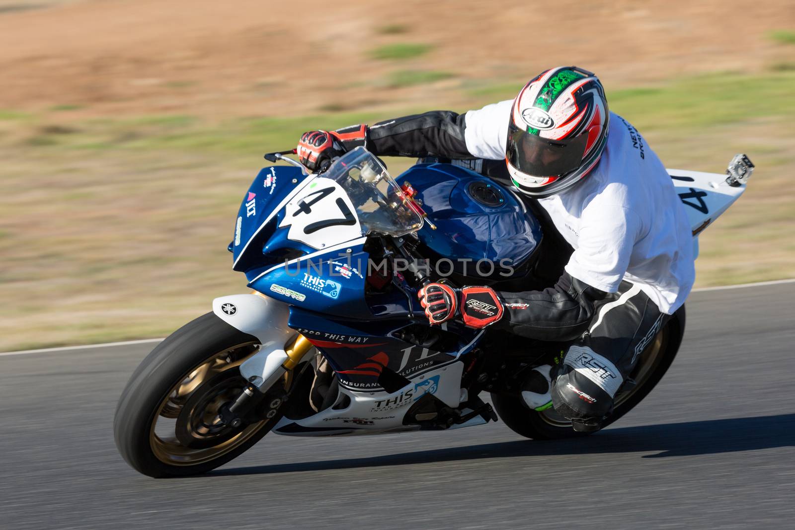 BROADFORD, VICTORIA/AUSTRALIA - MARCH 20: A mix of bikes and sidecars tussle against each other at Round 1 of the Interclub Series at The Broadford Motorcycle Complex near Melbourne.