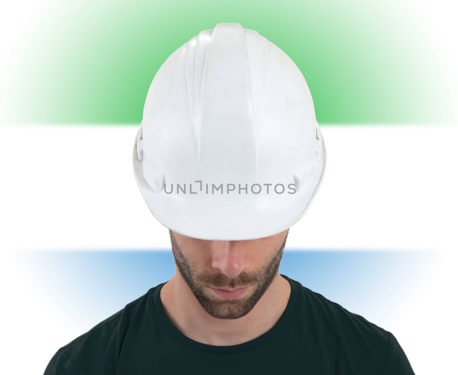 Isolated engineer with flag on background - Sierra Leone