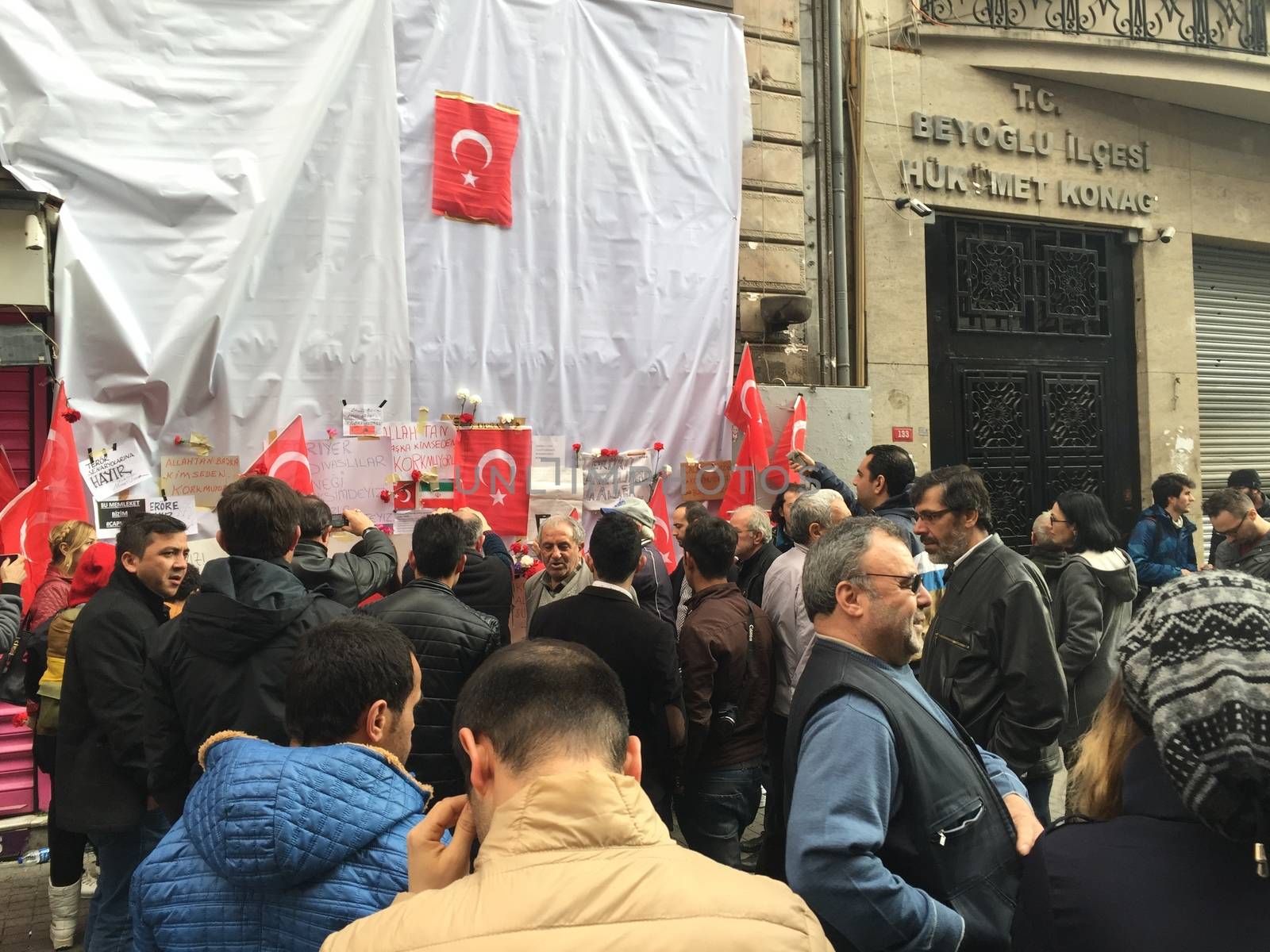 TURKEY, Istanbul: People gather at the site of a blast on Istiklal Street, a major shopping and tourist district, in central Istanbul on March 20, 2016 in tribute to four people killed during a suicide blast that ripped through Istanbul less than a week after another deadly attack left 35 dead in Ankara.