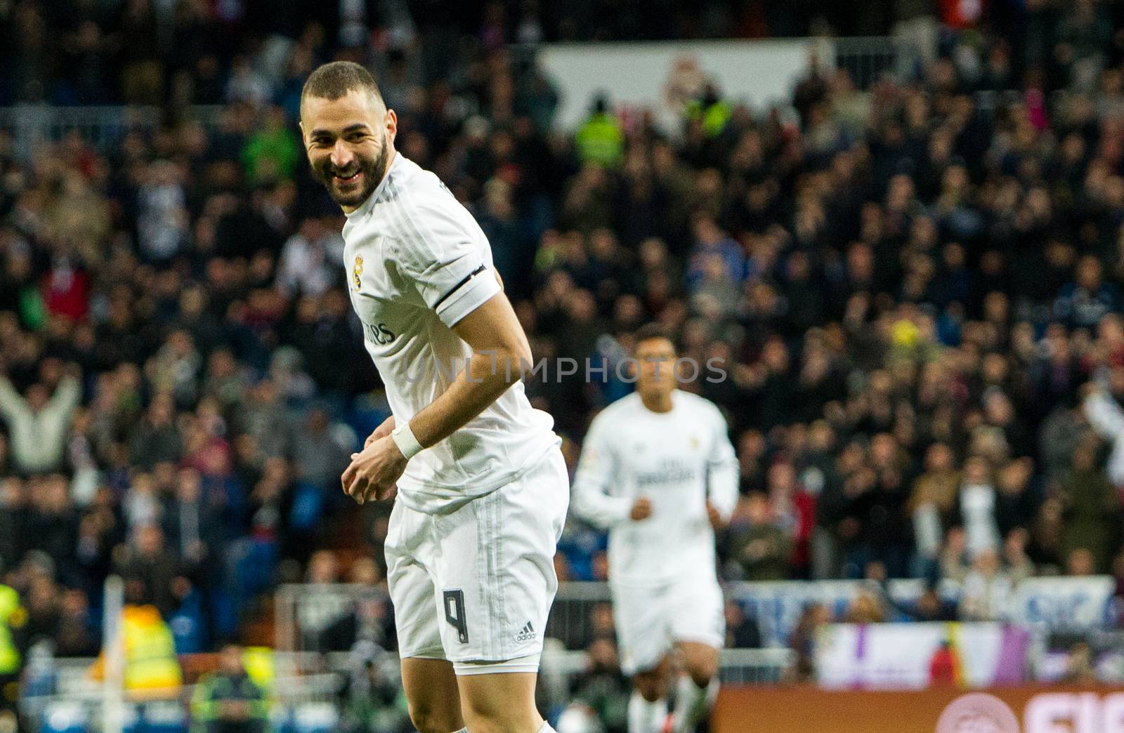 SPAIN, Madrid: Real Madrid's French Karim Benzema celebrates scoring  during Spanish Liga football match Real Madrid vs Sevilla at Santiago Bernabeu stadium in Madrid on March 20, 2016.