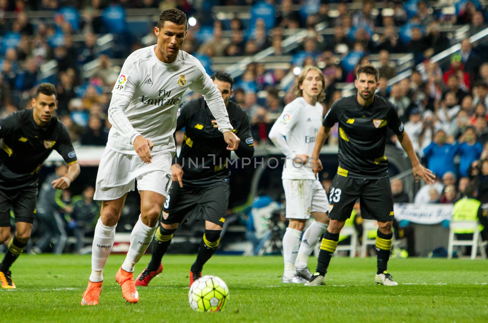 SPAIN, Madrid: Real Madrid's Portuguese forward Cristiano Ronaldo in action during the Spanish league football match Real Madrid CF vs Sevilla FC at the Santiago Bernabeu stadium in Madrid on March 20, 2016. 