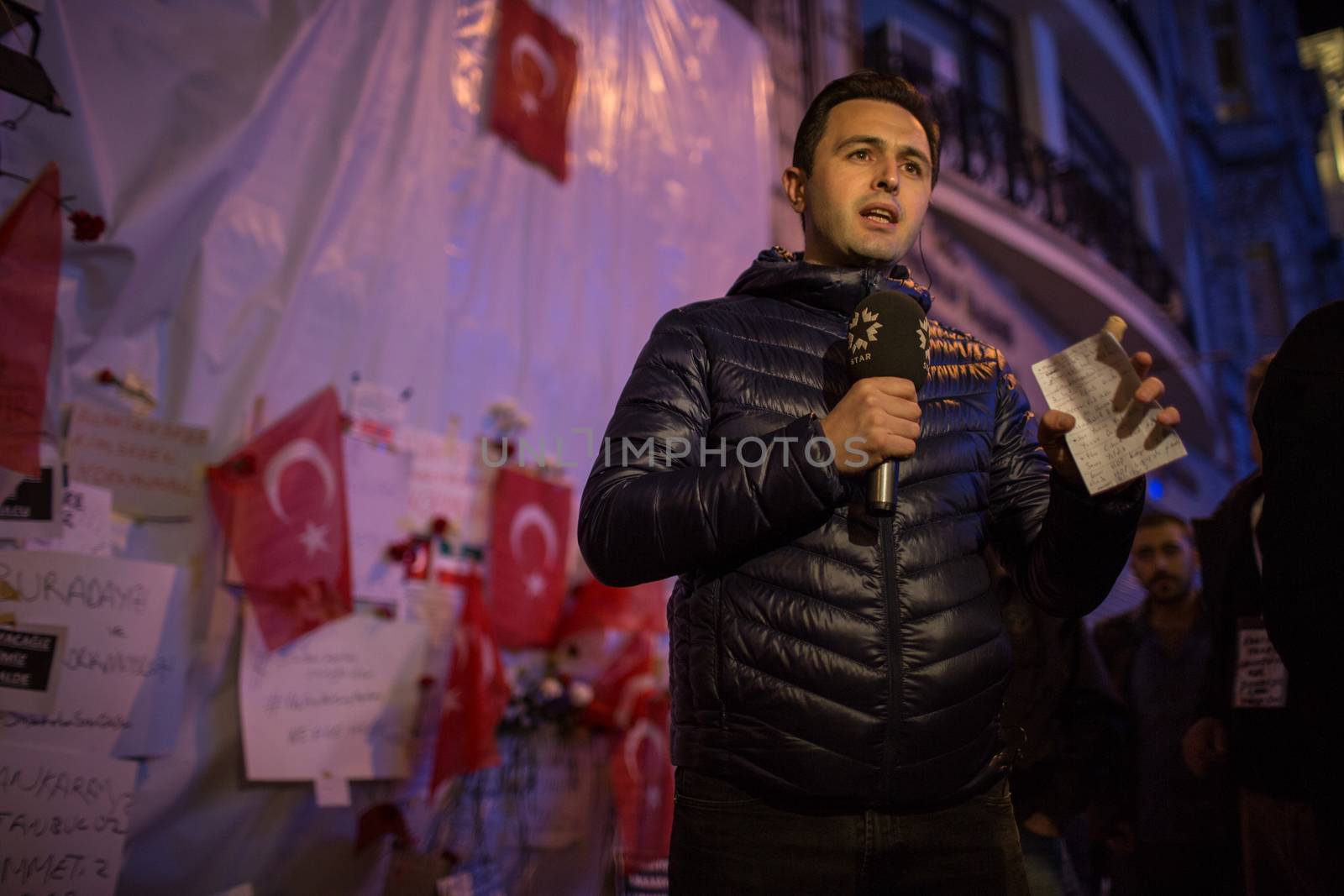 TURKEY, Istanbul: A TV reporter is pictured at the site of a blast on Istiklal Street, a major shopping and tourist district, in central Istanbul on March 20, 2016, as people pay tribute to four people killed during a suicide blast that ripped through Istanbul less than a week after another deadly attack left 35 dead in Ankara.