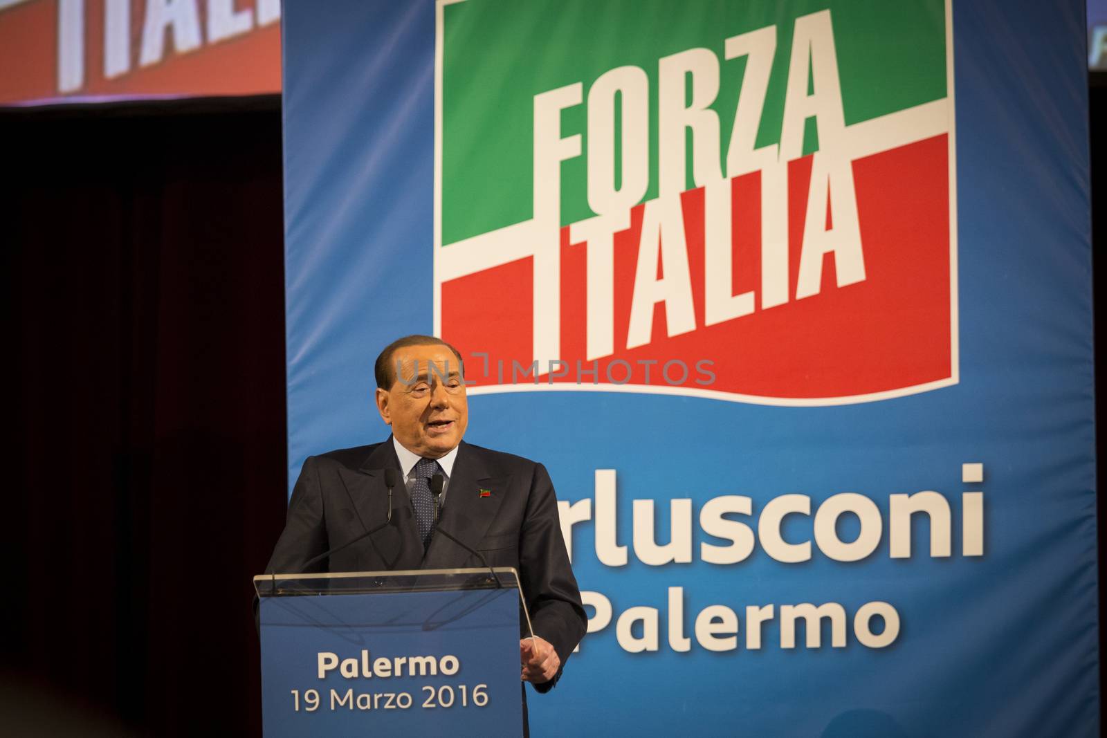 ITALY, Palermo: Former Italian Prime Minister Silvio Berlusconi waves his supporters during a meeting of his party Forza Italia, in Palermo, Sicily, on March 19, 2016. In June 2013, Berlusconi announced the refoundation of his first party Forza Italia.