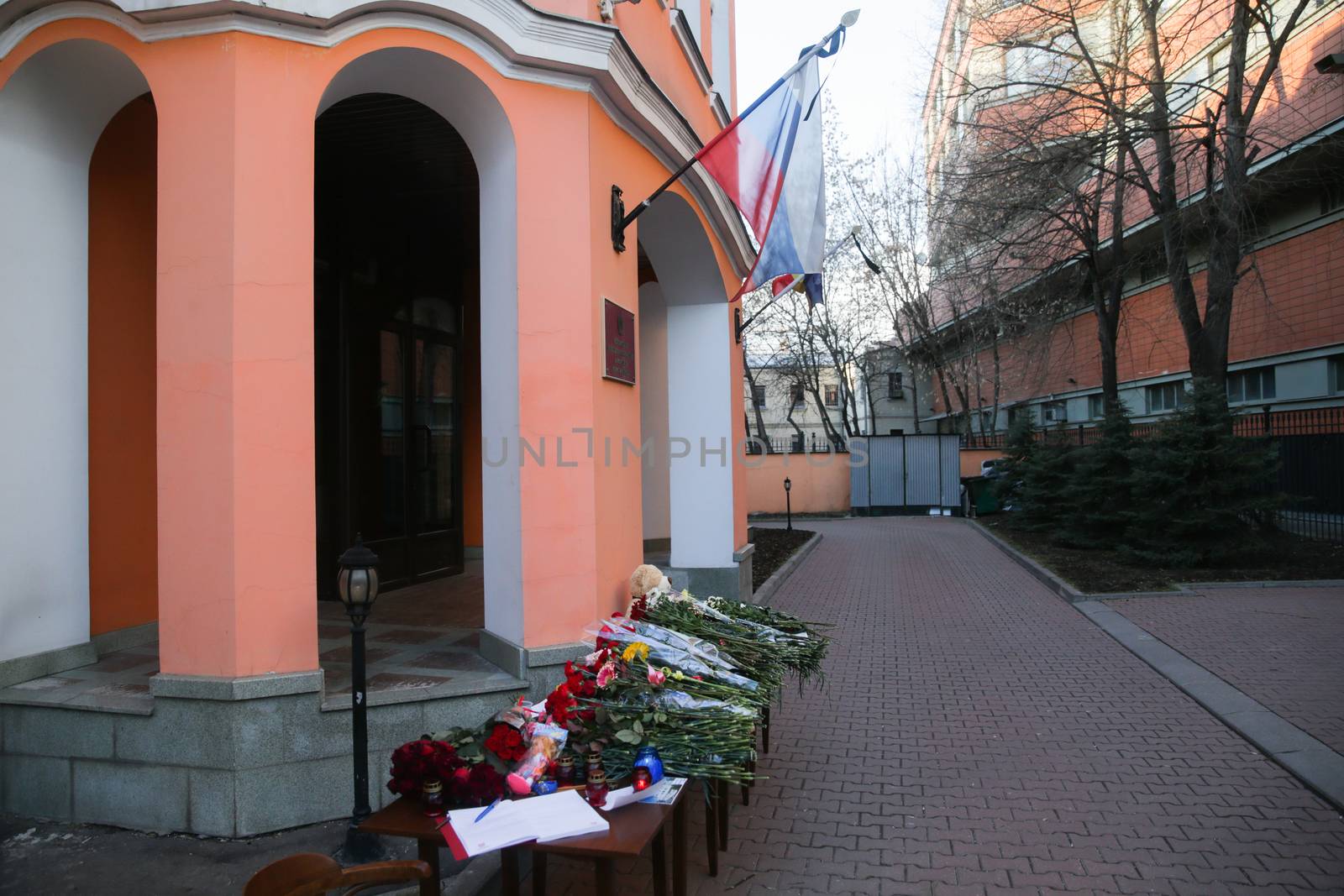 RUSSIA, Moscow: People bring flowers to the Moscow representative office of Rostov-on-Don city, on March 20, 2016 where passenger plane Boeing-737-800 crashed at landing. The plane crashed in southern Russia early on March 19, killing all 62 people on board as it tried to land in bad weather in the city of Rostov-on-Don.