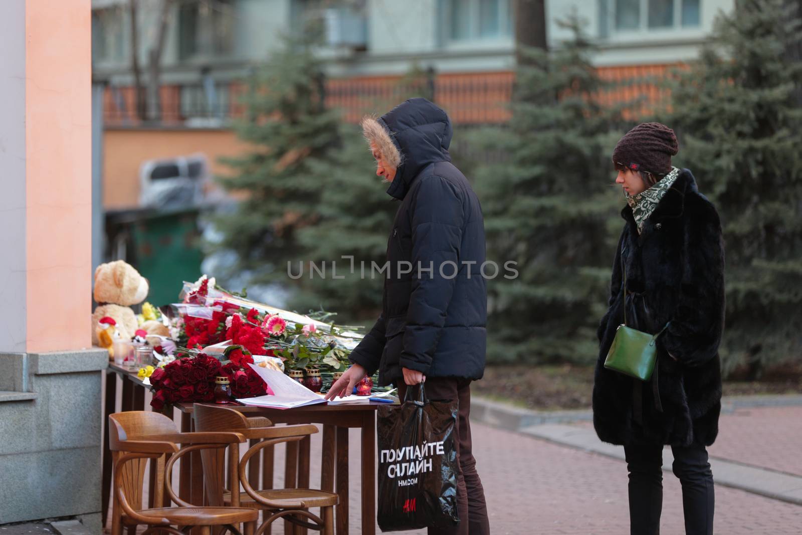 RUSSIA, Moscow: People bring flowers to the Moscow representative office of Rostov-on-Don city, on March 20, 2016 where passenger plane Boeing-737-800 crashed at landing. The plane crashed in southern Russia early on March 19, killing all 62 people on board as it tried to land in bad weather in the city of Rostov-on-Don.