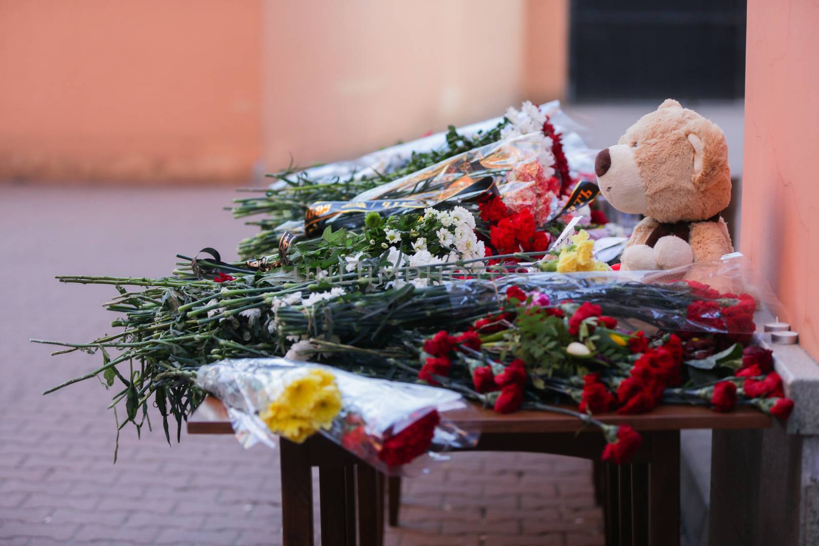 RUSSIA, Moscow: People bring flowers to the Moscow representative office of Rostov-on-Don city, on March 20, 2016 where passenger plane Boeing-737-800 crashed at landing. The plane crashed in southern Russia early on March 19, killing all 62 people on board as it tried to land in bad weather in the city of Rostov-on-Don.