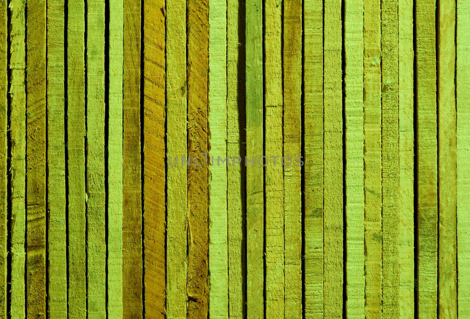 Green and Sand Colored Background of Cracked Wooden Plank closeup