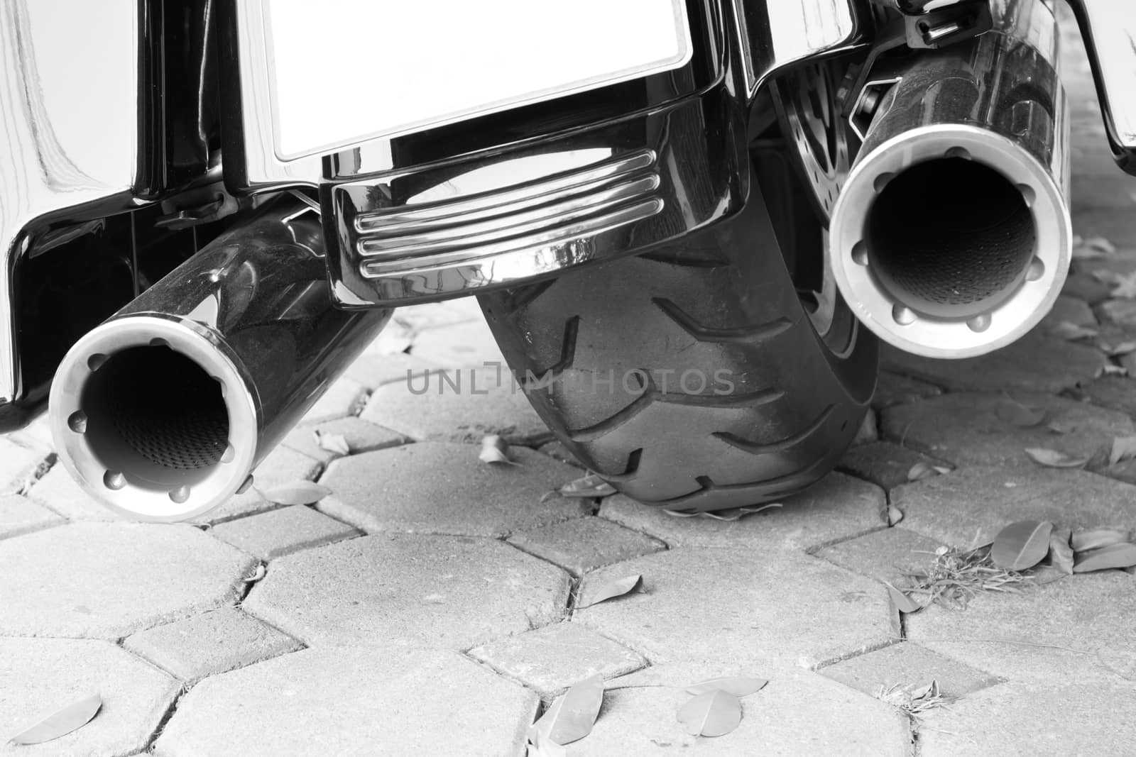 Motorcycle  double exhaust black and white background by worrayuth
