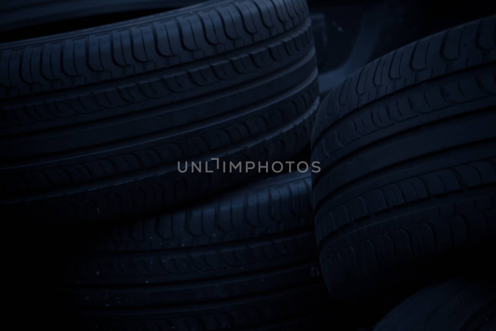 Old rubber tires for black background by worrayuth