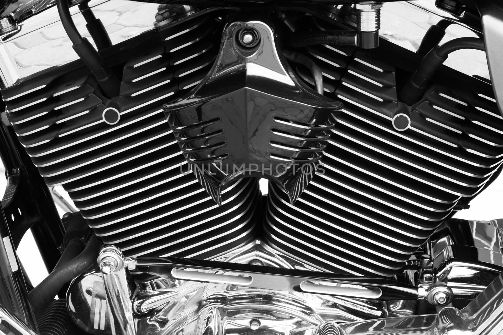 Motorbike's chromed engine black and white background