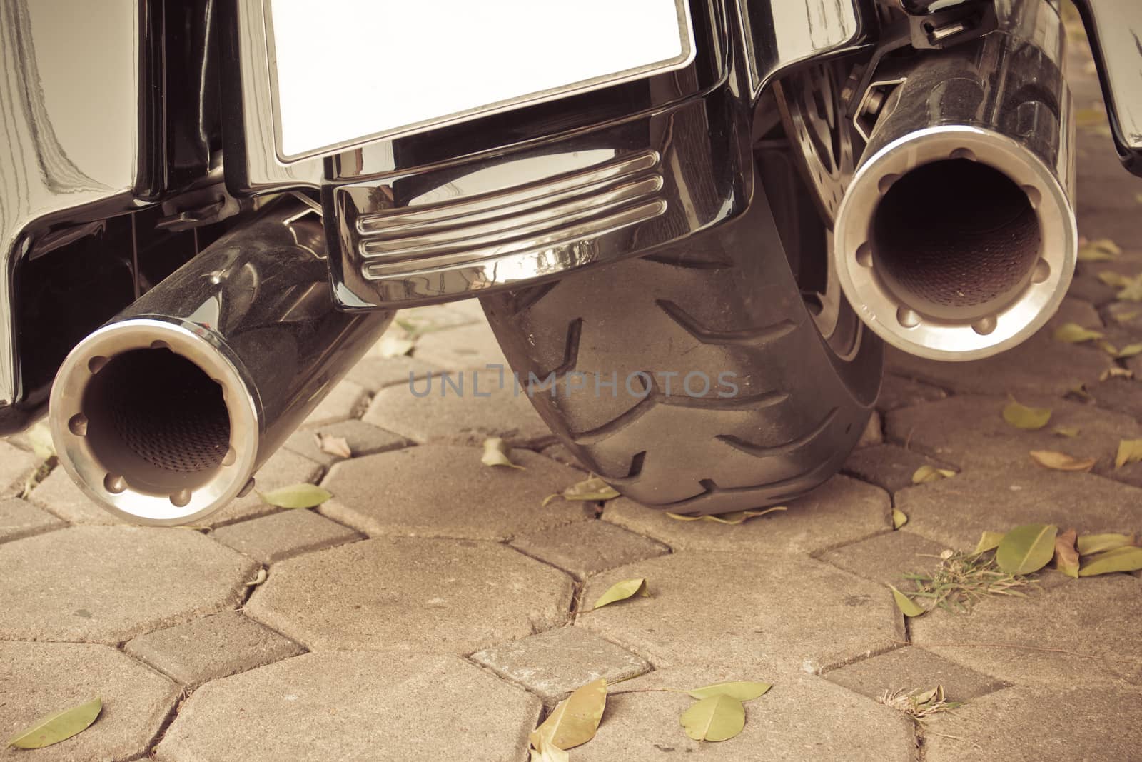 Motorcycle  double exhaust sepia background by worrayuth