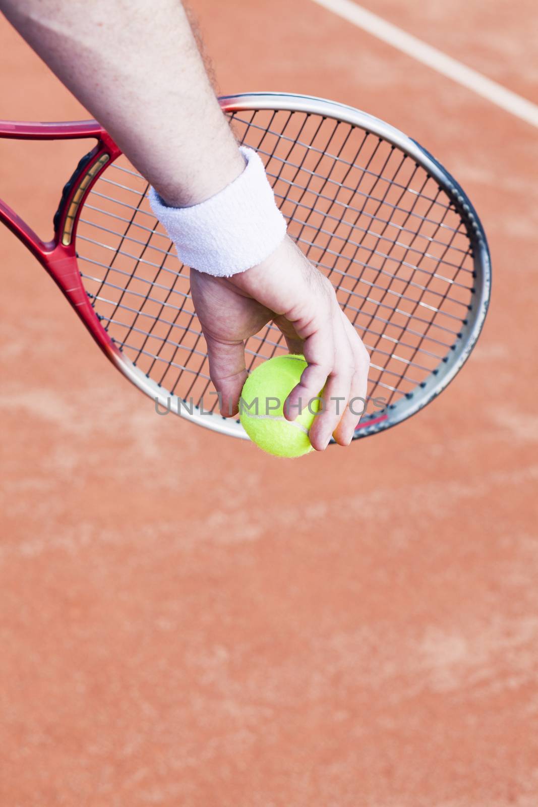 tennis background with tennis equipment on clay course