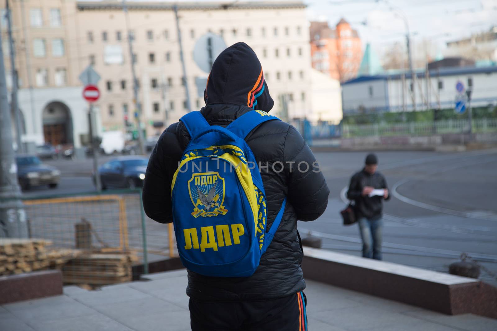 A man with a backpack back LDPR