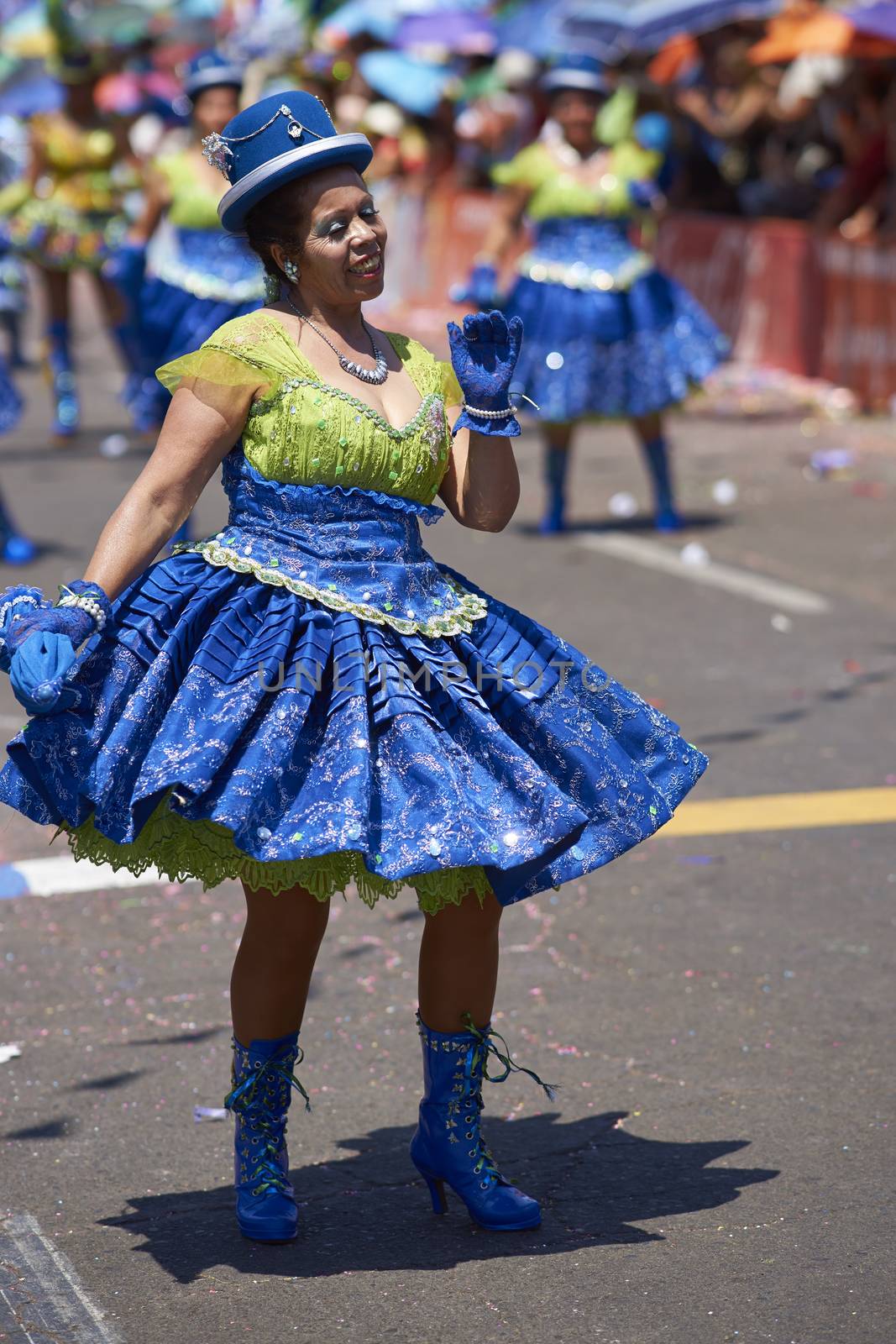 Morenada dancers in traditional Andean costume performing at the annual Carnaval Andino con la Fuerza del Sol in Arica, Chile.