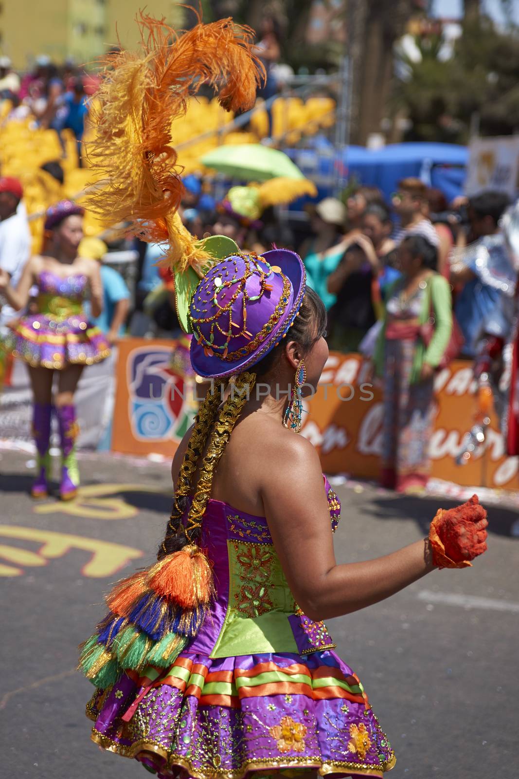 Morenada dancers in traditional Andean costume performing at the annual Carnaval Andino con la Fuerza del Sol in Arica, Chile.