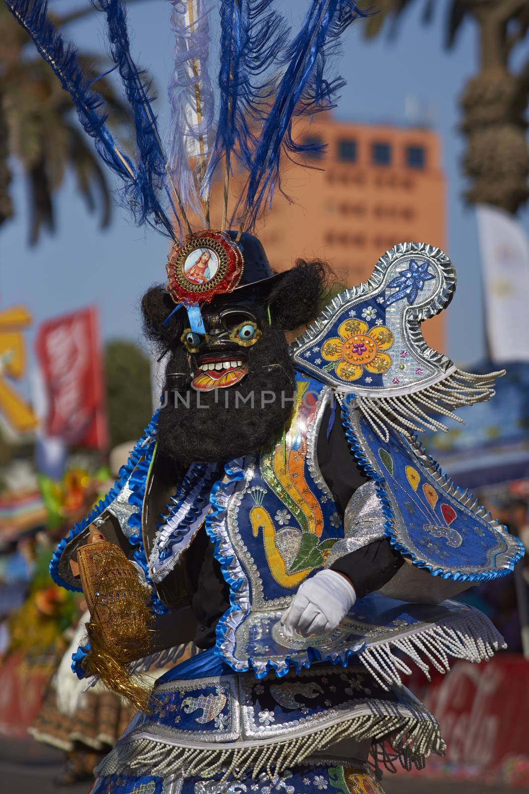 Morenada dancer in traditional Andean costume performing at the annual Carnaval Andino con la Fuerza del Sol in Arica, Chile.