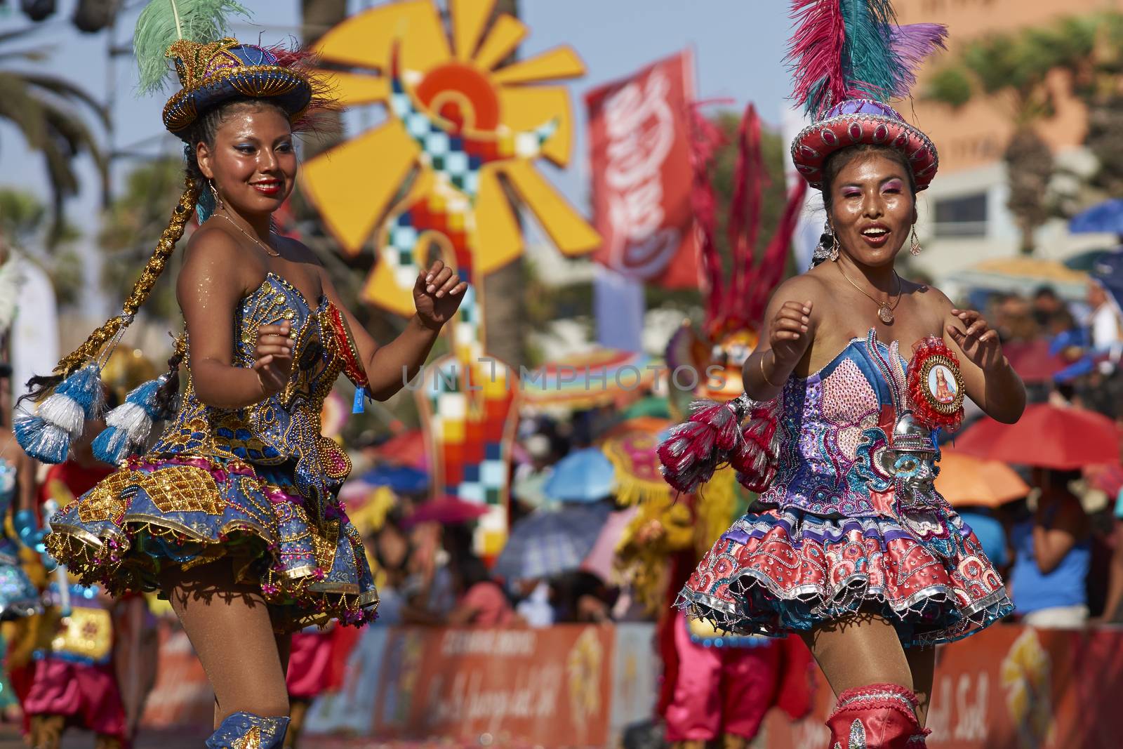 Morenada dancers in traditional Andean costume performing at the annual Carnaval Andino con la Fuerza del Sol in Arica, Chile.