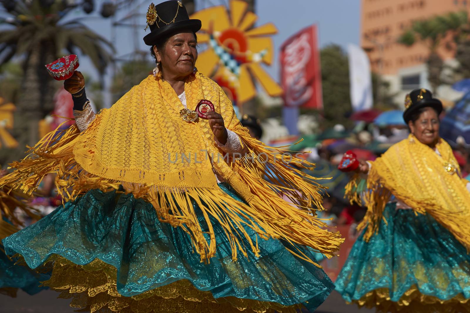 Morenada dancers in traditional Andean costume performing at the annual Carnaval Andino con la Fuerza del Sol in Arica, Chile.