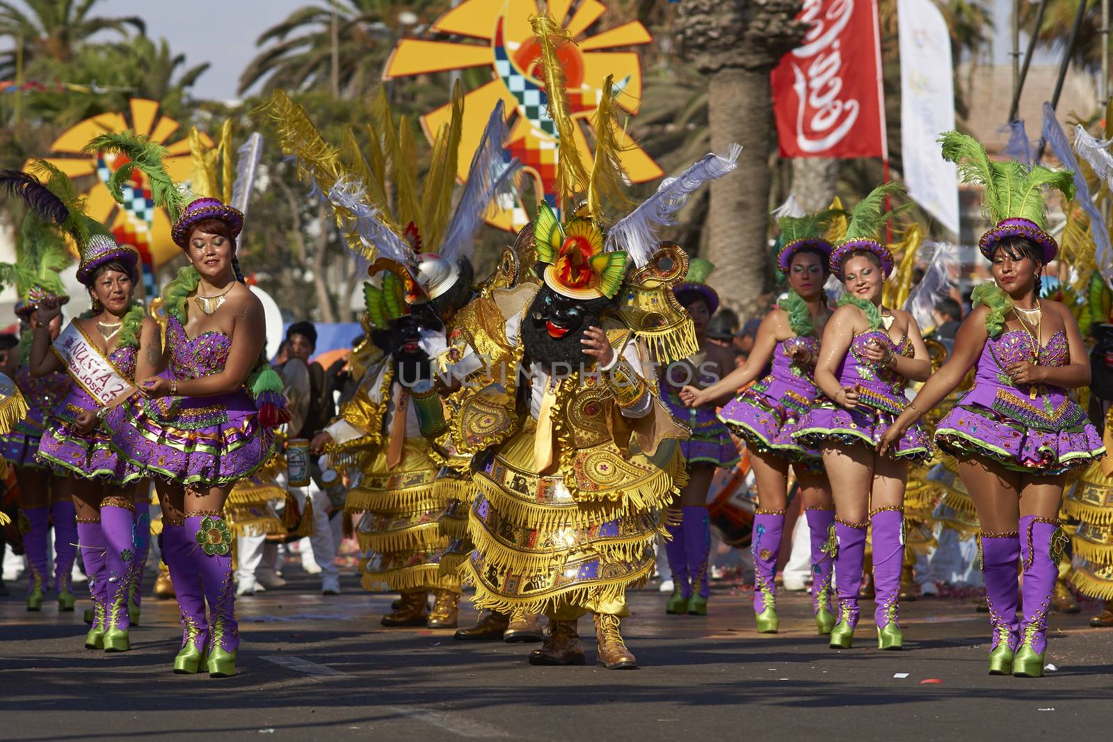Morenada dancers in traditional Andean costume performing at the annual Carnaval Andino con la Fuerza del Sol in Arica, Chile.