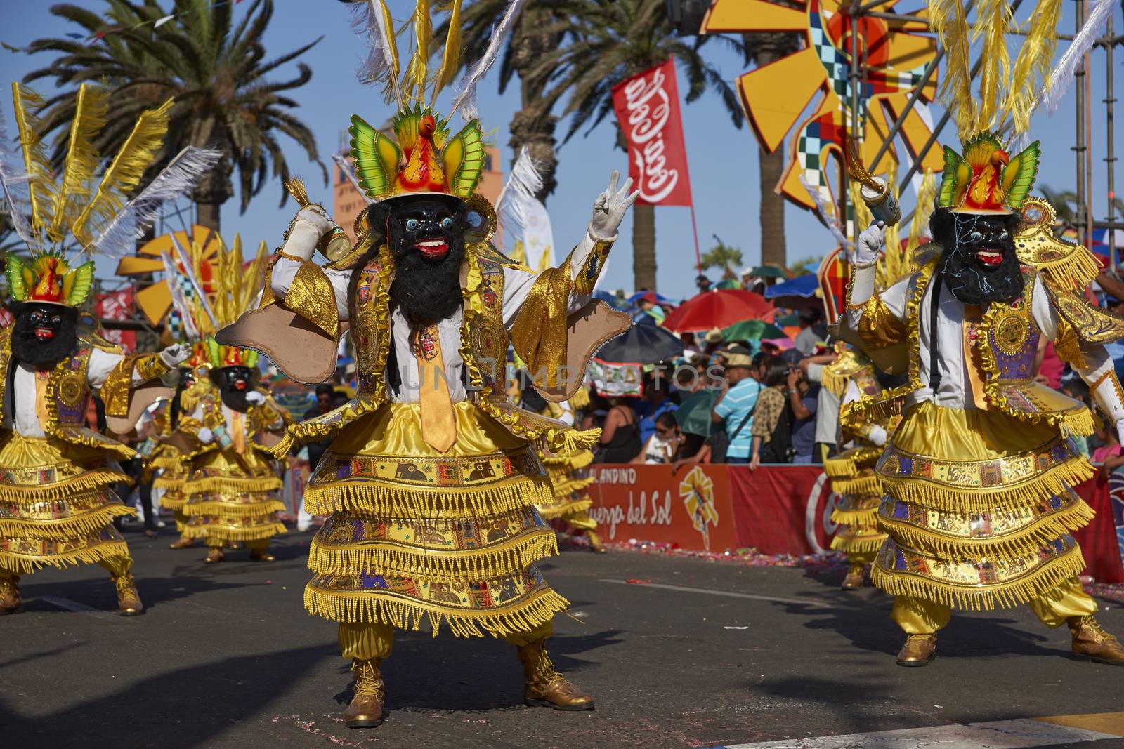 Morenada dancers in traditional Andean costume performing at the annual Carnaval Andino con la Fuerza del Sol in Arica, Chile.