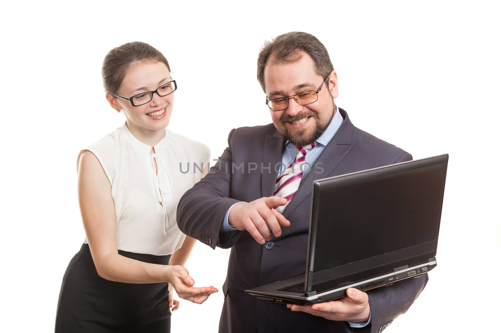 partners conduct negotiations standing and look at the laptop