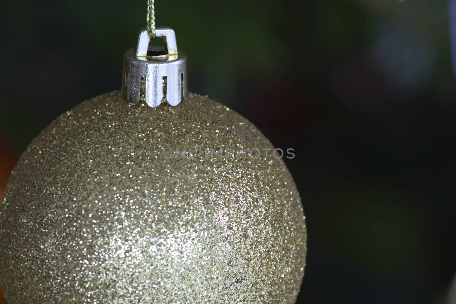 Decorated christmas tree with beautiful toys on it.