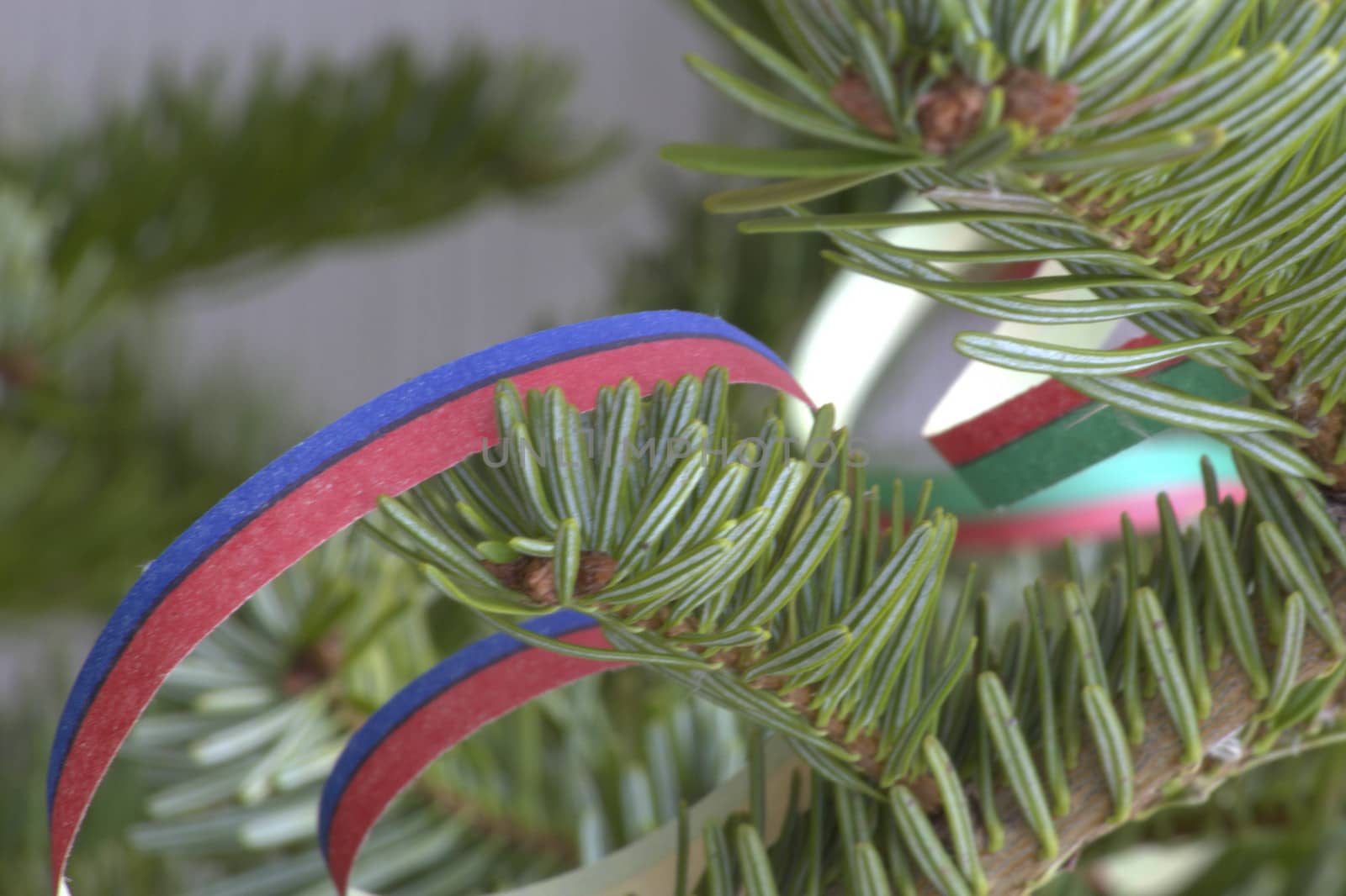 Decorated christmas tree with beautiful toys on it.