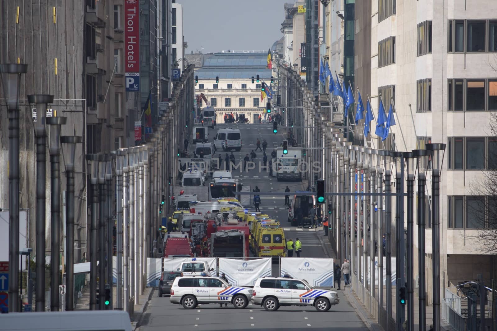BELGIUM, Brussels : Police and emergency vehicles are pictured near Maelbeek metro station in Brussels, which has been evacuated after an explosion on March 22, 2016. Brussels' public transport company STIB-MIVB has confirmed injuries, although no deaths have been reported. Earlier this morning at least 13 people have been killed after two explosions occurred in the departure hall of Brussels Airport in Zaventem. Government sources speak of a terrorist attack. The terrorist threat level has been heightened to four across the country.