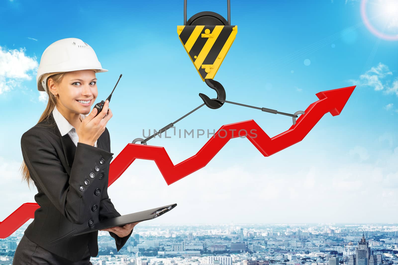Businesslady with walkie-talkie set and graphical chart