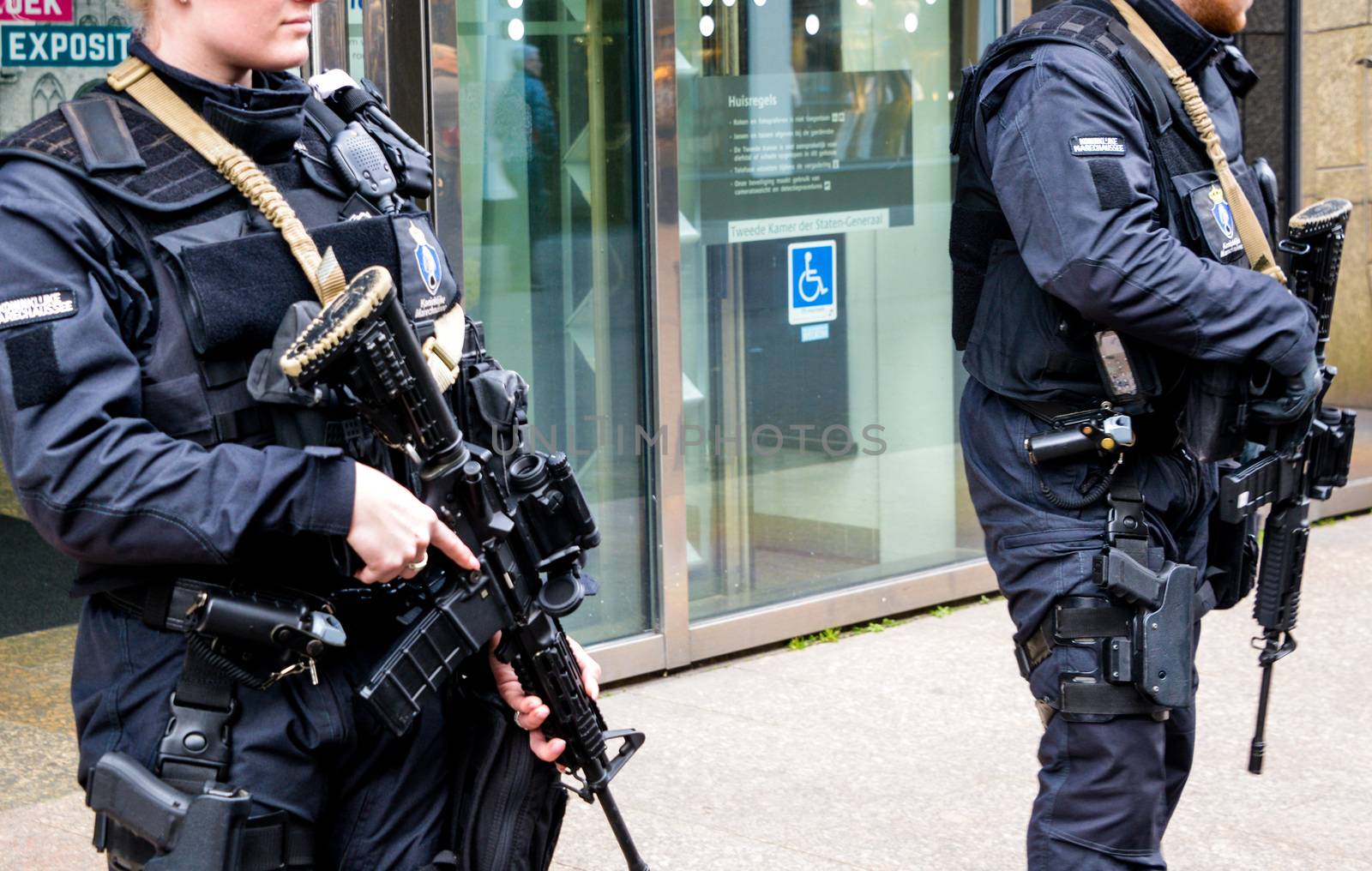 NETHERLANDS, the Hague: Members of the Royal Military Police stand by as the Hague, the Netherlands is on high alert following the deadly attacks in Brussels, Belgium on March 22, 2016. The attacks, at least one of which was carried out by a suicide bomber, left at least 30 dead at Zaventem airport and Maelbeek metro station.