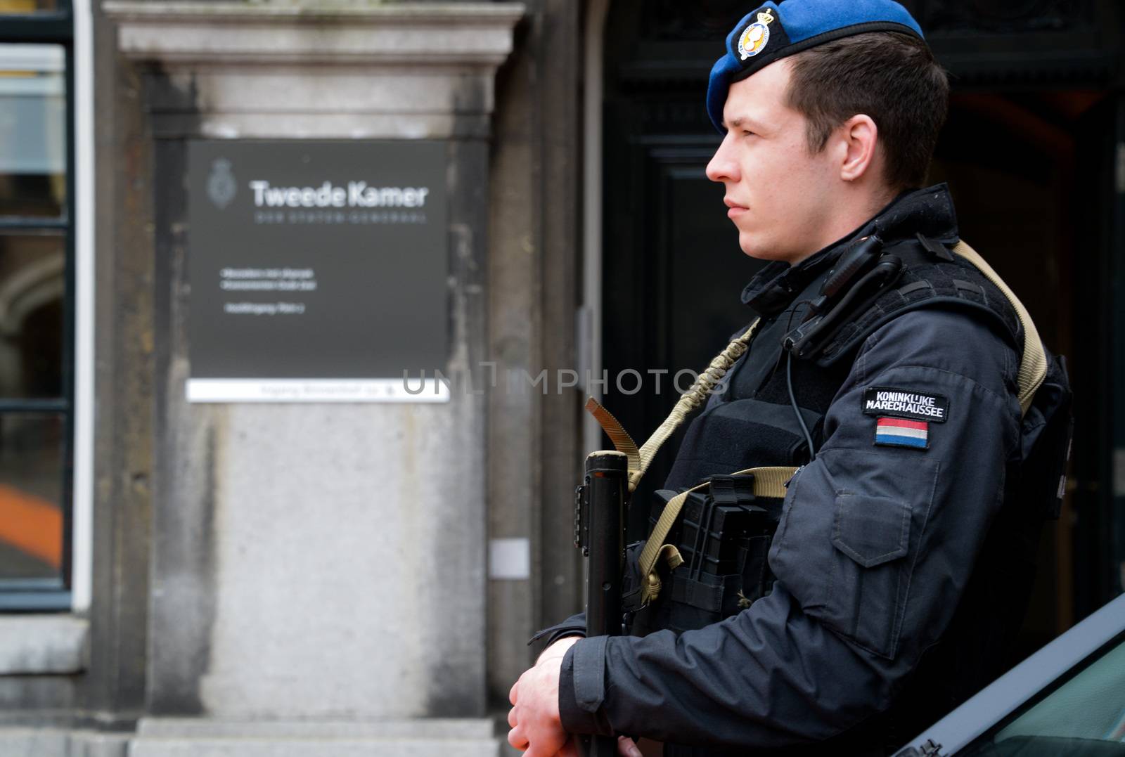 NETHERLANDS, the Hague: A member of the Royal Military Police stands by as the Hague, the Netherlands is on high alert following the deadly attacks in Brussels, Belgium on March 22, 2016. The attacks, at least one of which was carried out by a suicide bomber, left at least 30 dead at Zaventem airport and Maelbeek metro station.