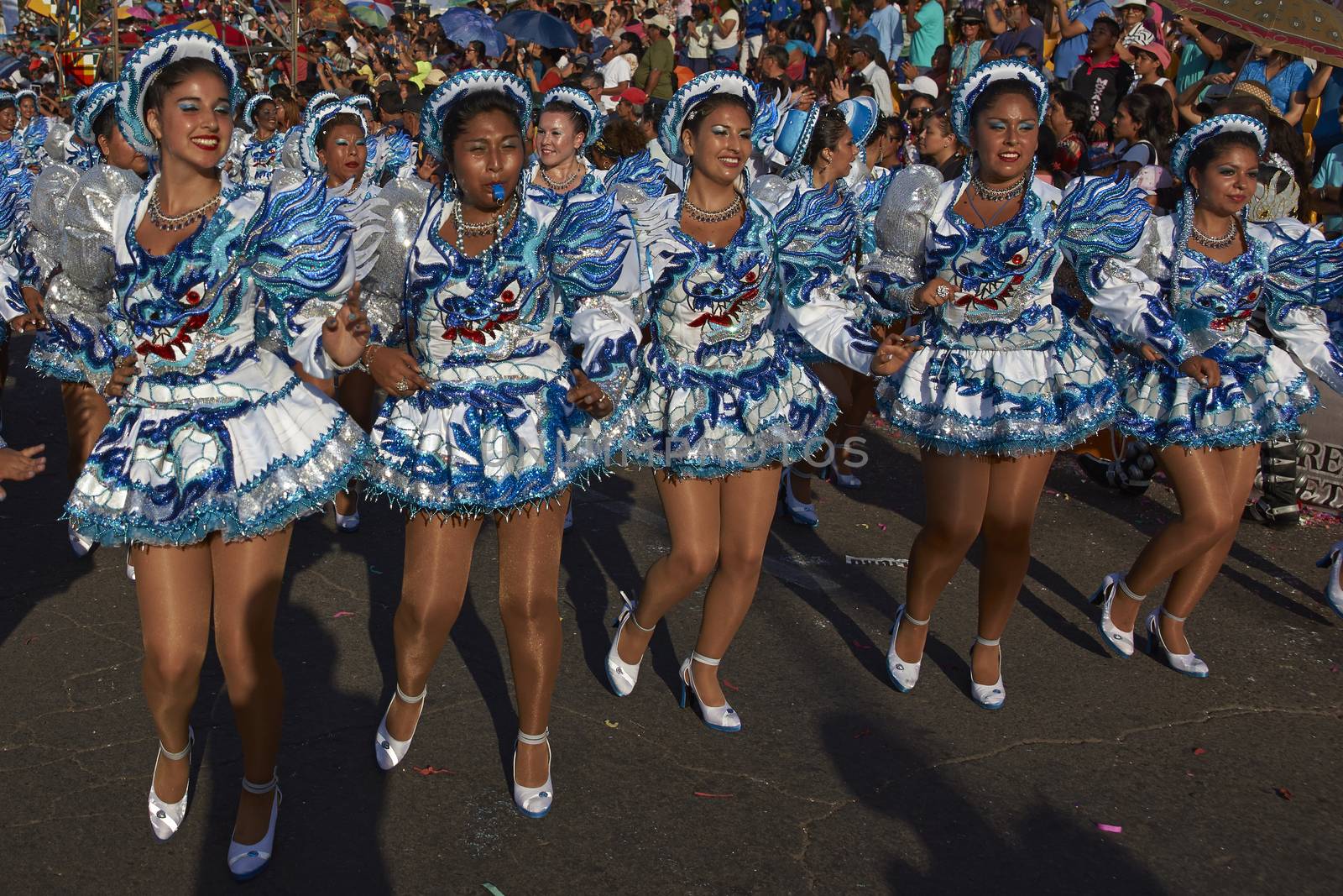 Caporales dancers in traditional Andean costume performing at the annual Carnaval Andino con la Fuerza del Sol in Arica, Chile.