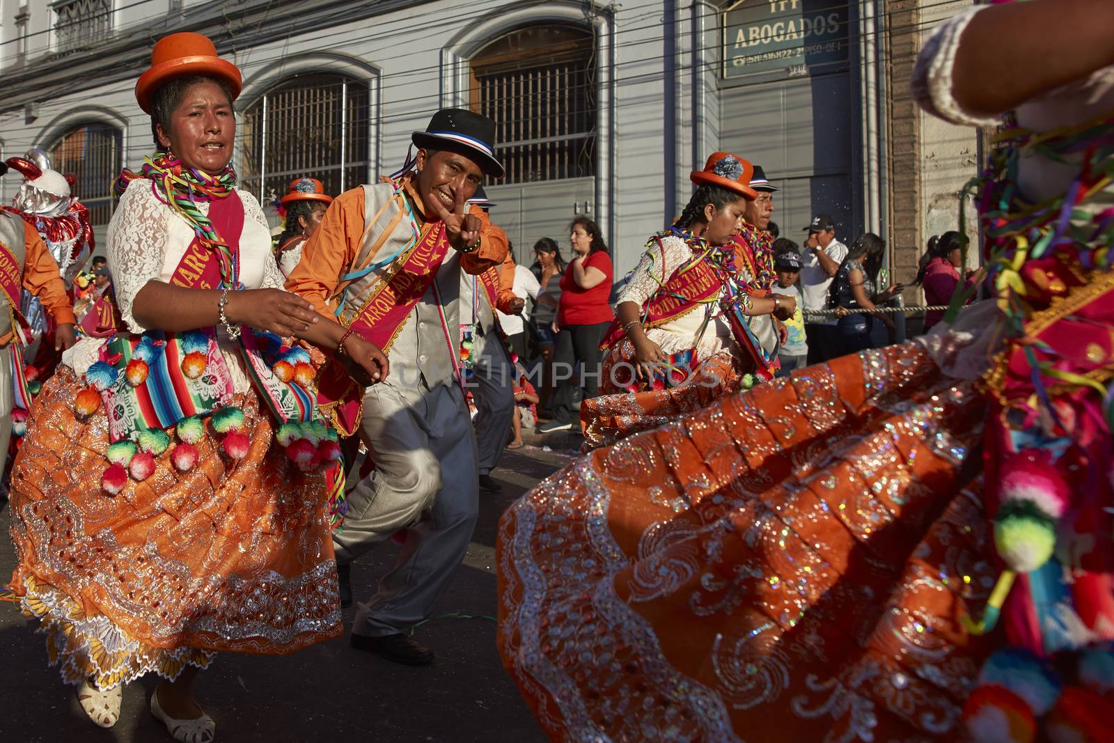 Music and dance group in traditional Andean costume performing at the annual Carnaval Andino con la Fuerza del Sol in Arica, Chile.