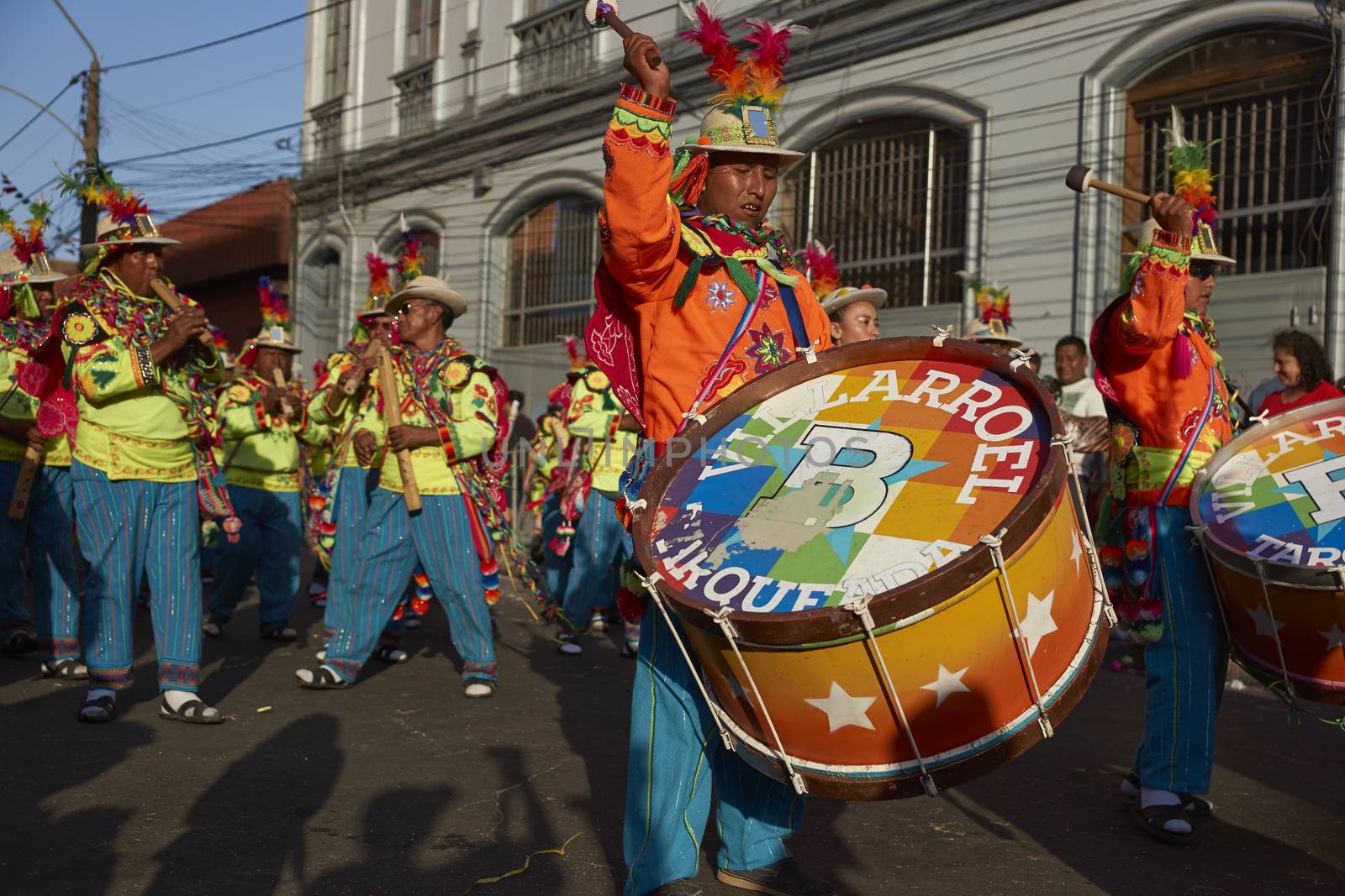 Music and dance group in traditional Andean costume performing at the annual Carnaval Andino con la Fuerza del Sol in Arica, Chile.