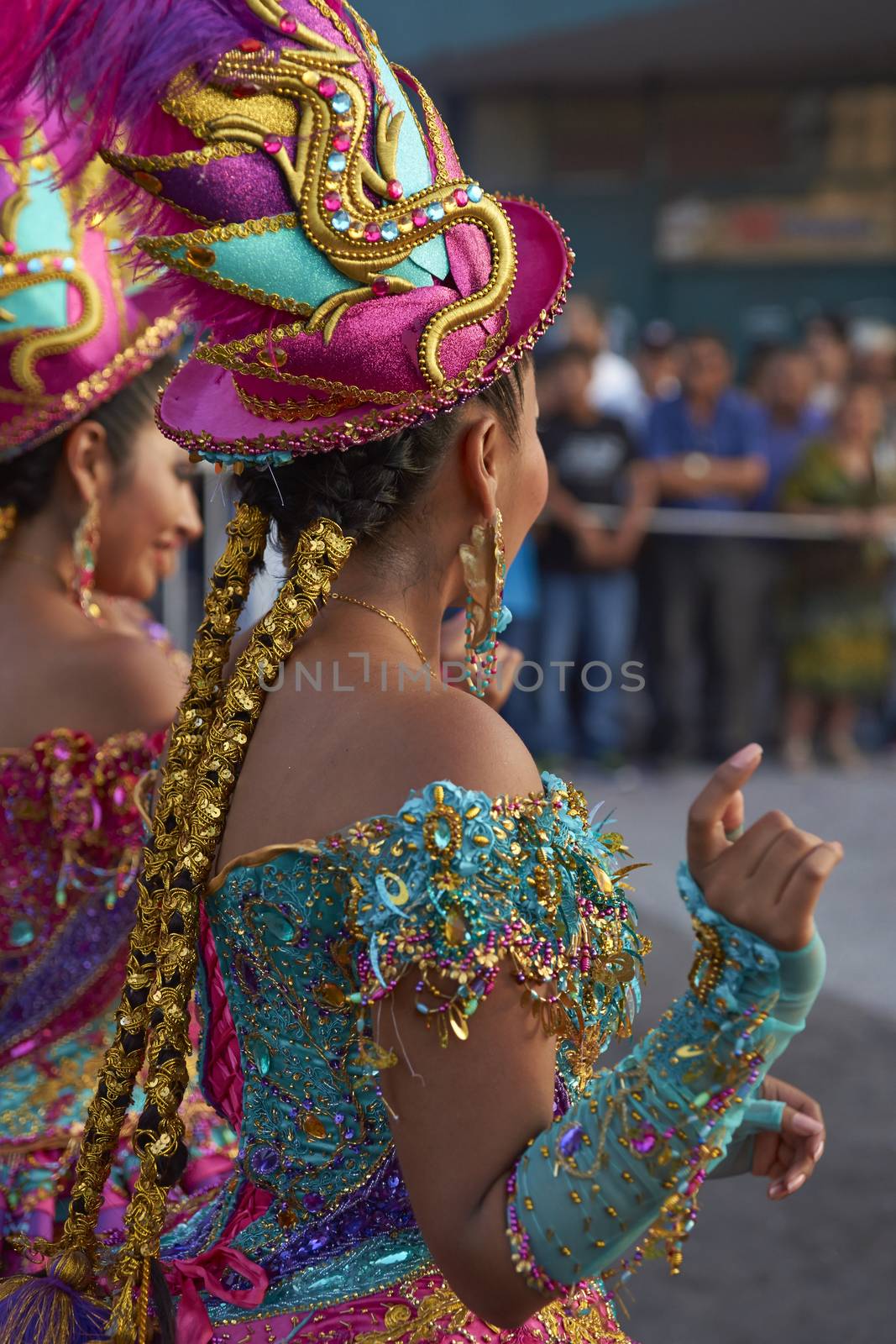 Morenada dancers in traditional Andean costume performing at the annual Carnaval Andino con la Fuerza del Sol in Arica, Chile.