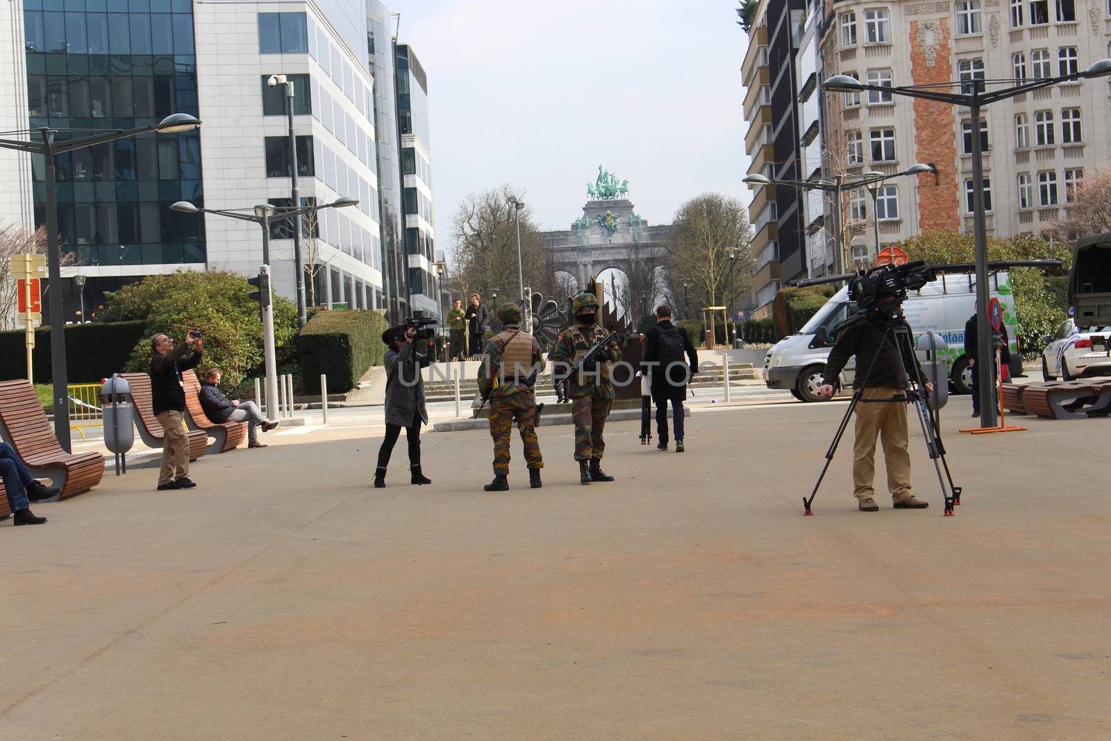 BELGIUM, Brussels: Soldiers and reporters are out en masse in Brussels, Belgium following the deadly attacks at Maelbeek metro station and Zaventem airport on March 22, 2016. The attacks, at least one of which was carried out by a suicide bomber, left at least 30 dead, and scores more injured.