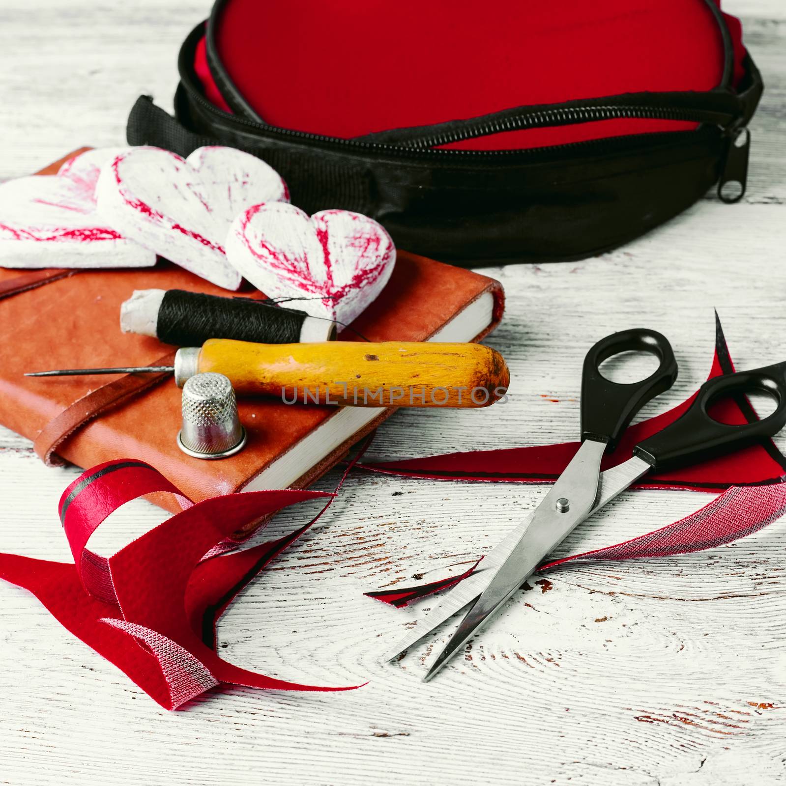 Sewing kit for needlework and leather scraps